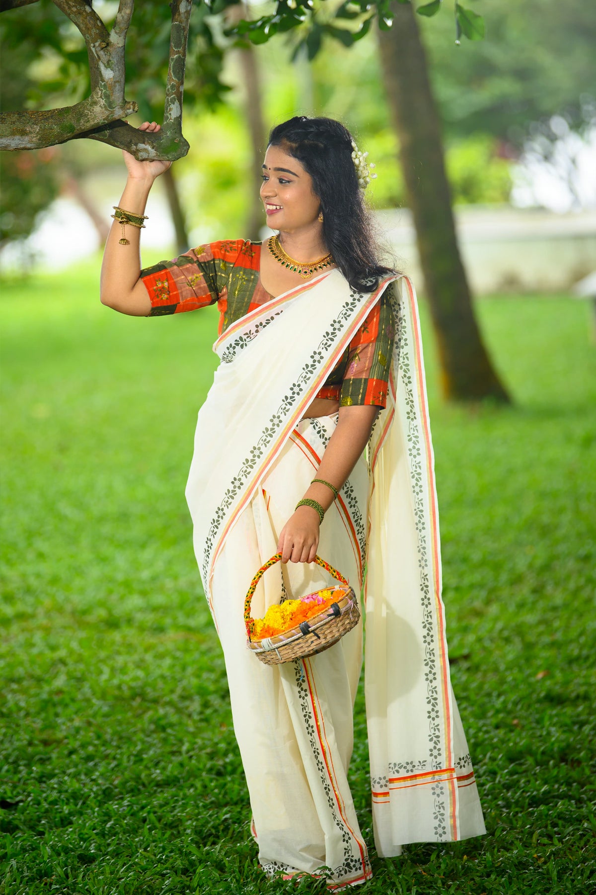 Chandrika – Orange and Golden Kasav Settumund with Printed Border and Designer Blouse Material