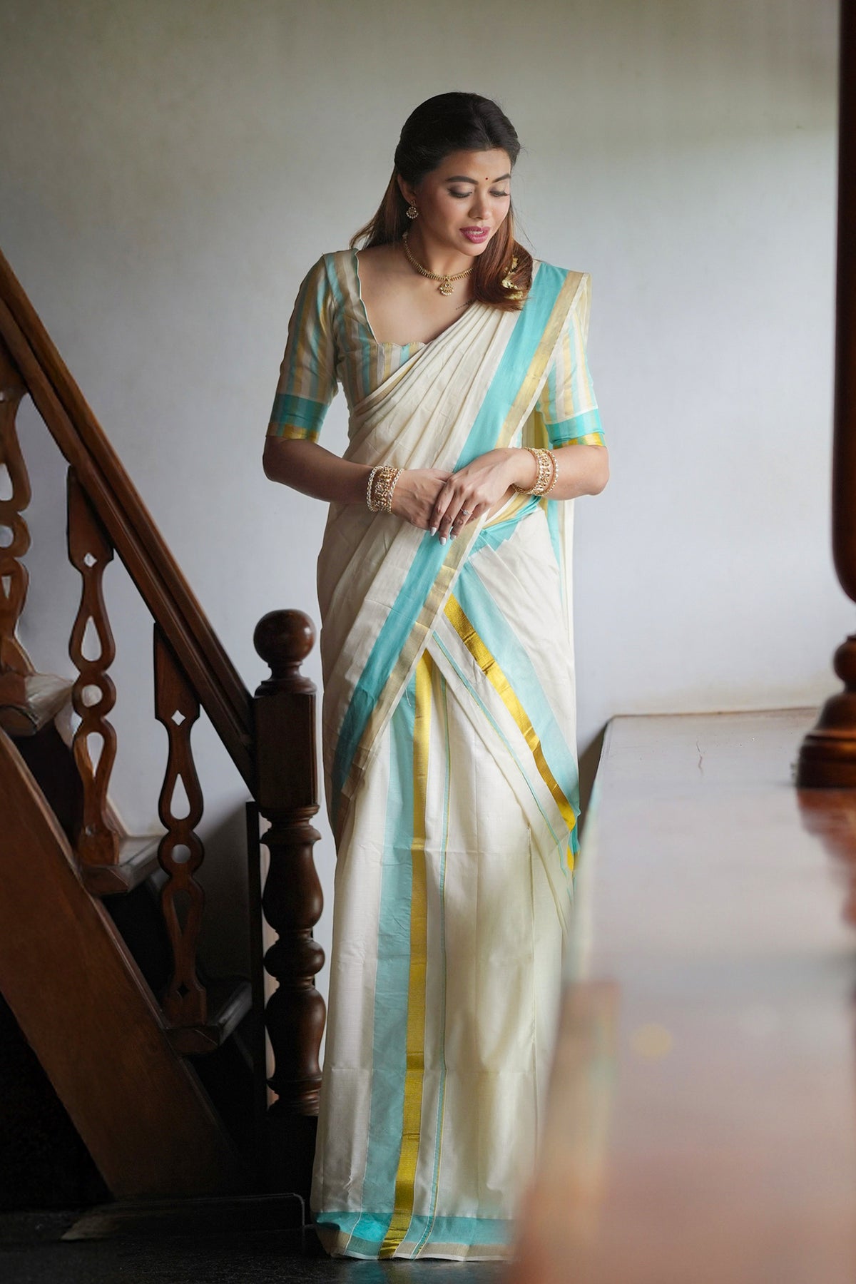 Radhika – Premium Kasav Settumund with Matching Striped Weave Blouse Material