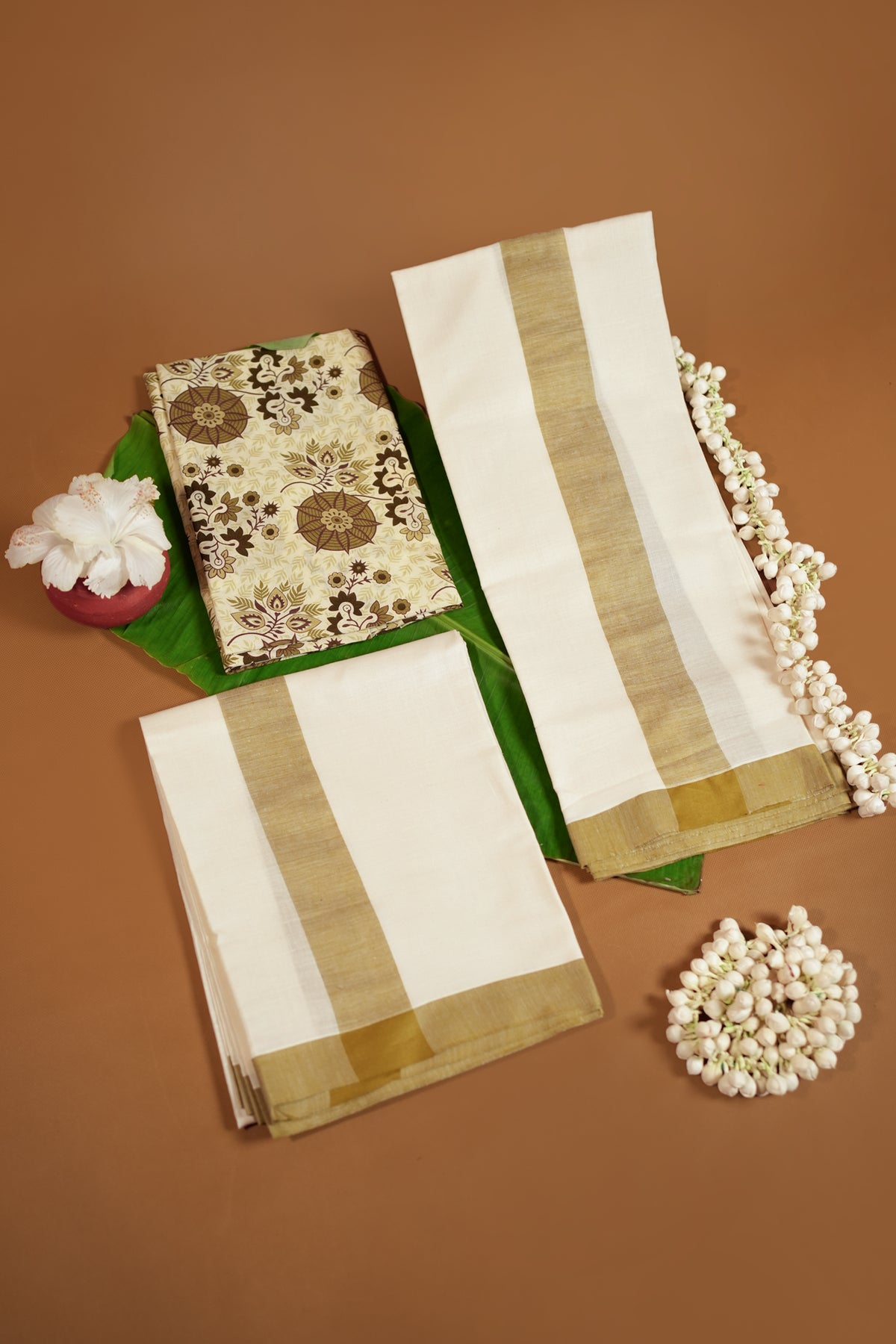 Vamika - Quality Settmundu With Matching Blouse Material