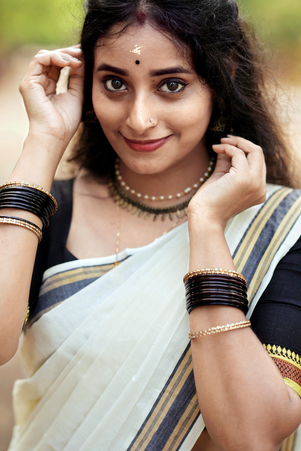 Kudamattam- Black and Golden Kasav Settumund with Golden Kasavu Border Black Blouse Material