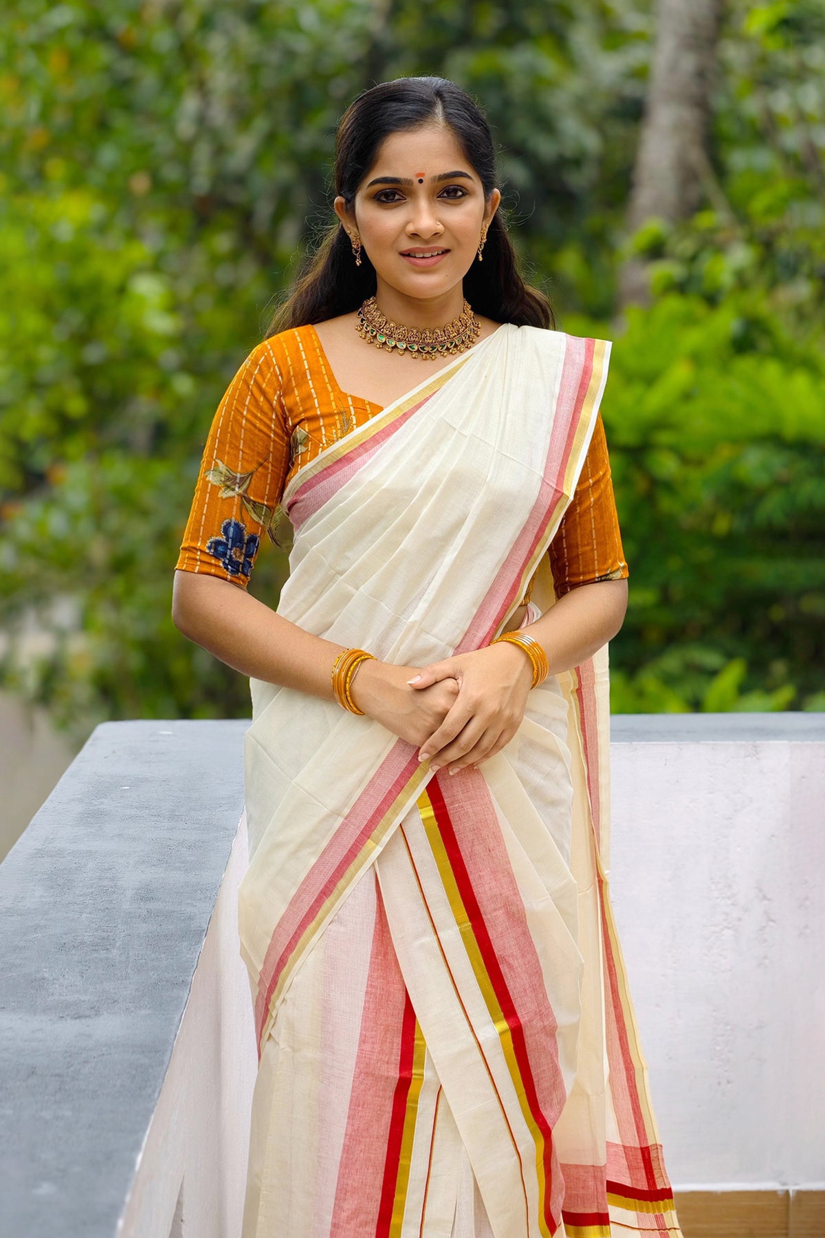 Chendumalli – Yellowish Orange and Golden Kasavu Settumund with Designer Blouse Material
