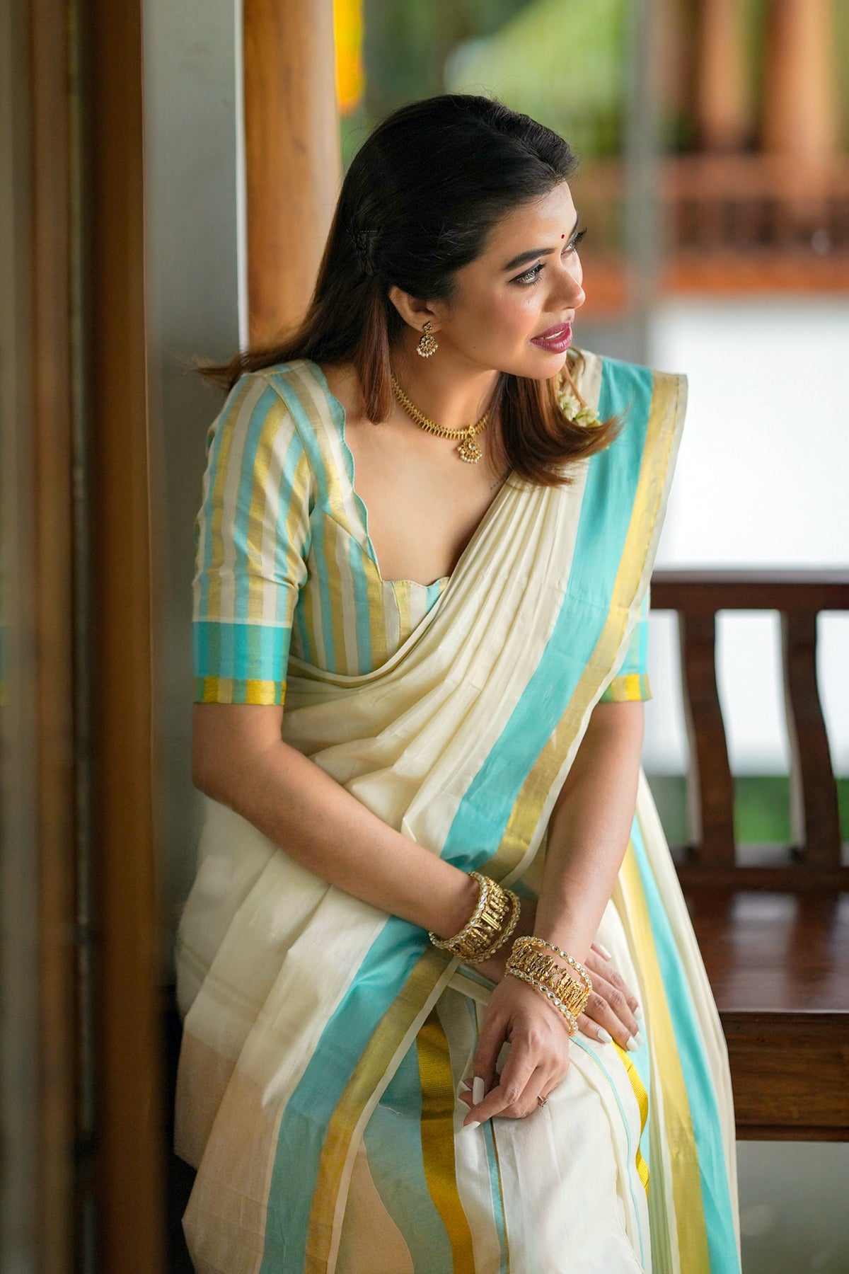 Radhika – Premium Kasav Settumund with Matching Striped Weave Blouse Material