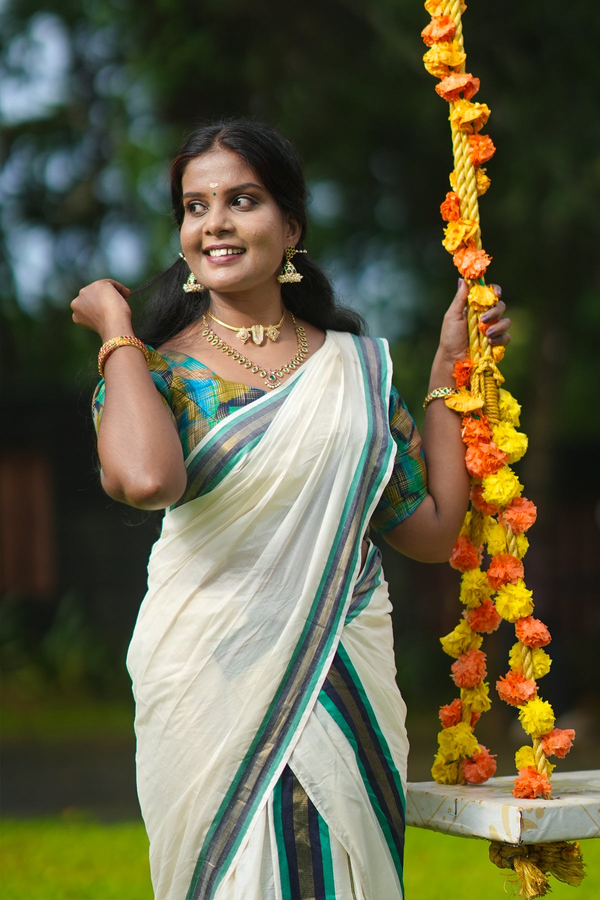 Hiranmayi Settumundu with Green & Light Golden Border and Matching Blouse Material