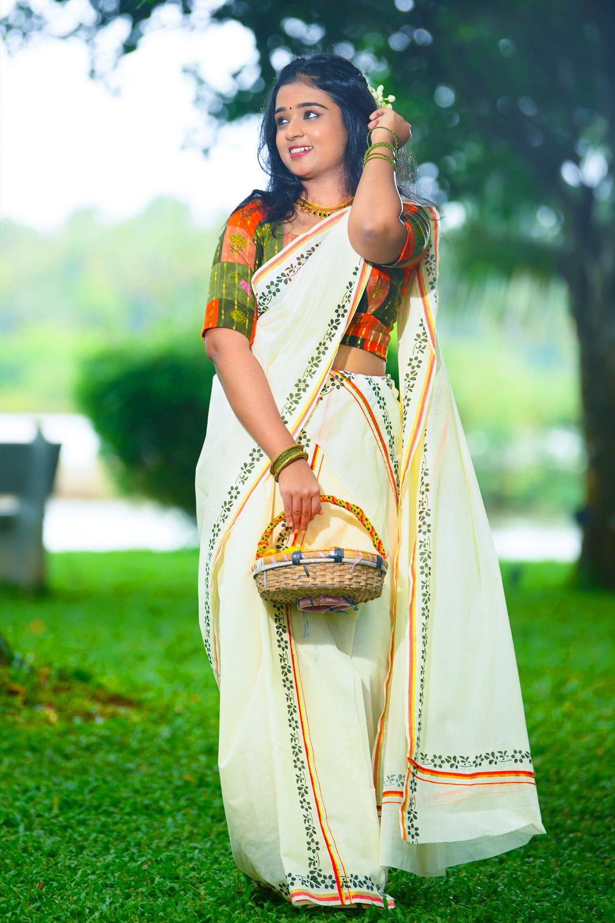 Chandrika – Orange and Golden Kasav Settumund with Printed Border and Designer Blouse Material