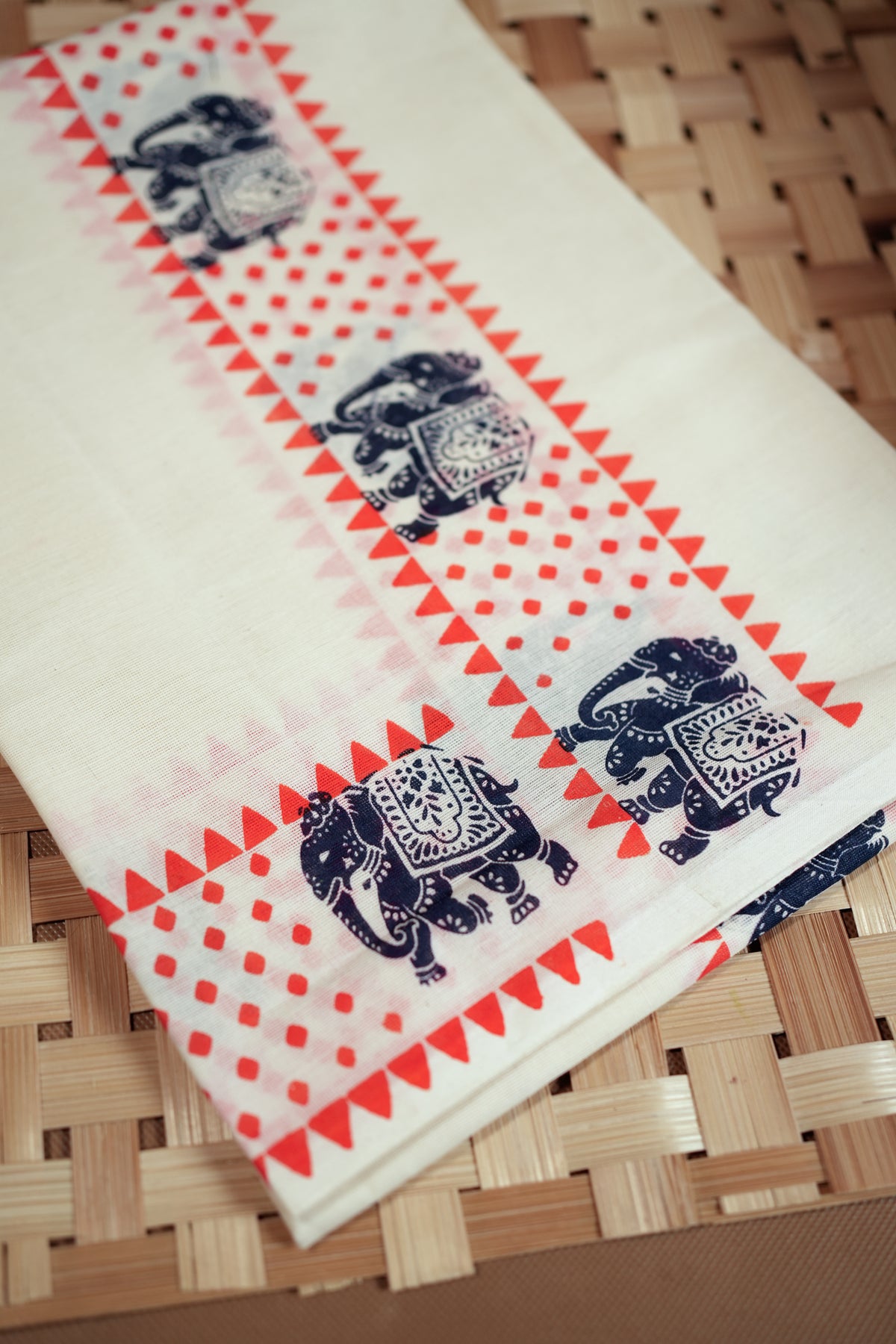 Aanachantham- Orange and Navy Blue Elephant Printed Settumund with Matching Blouse Material