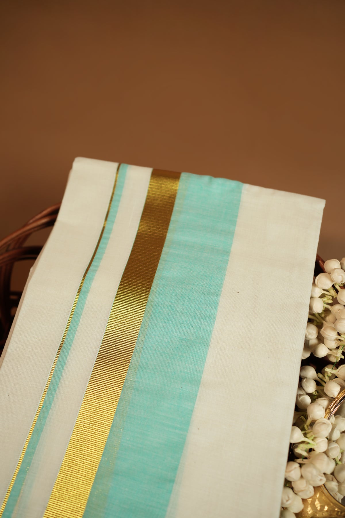 Radhika – Premium Kasav Settumund with Matching Striped Weave Blouse Material