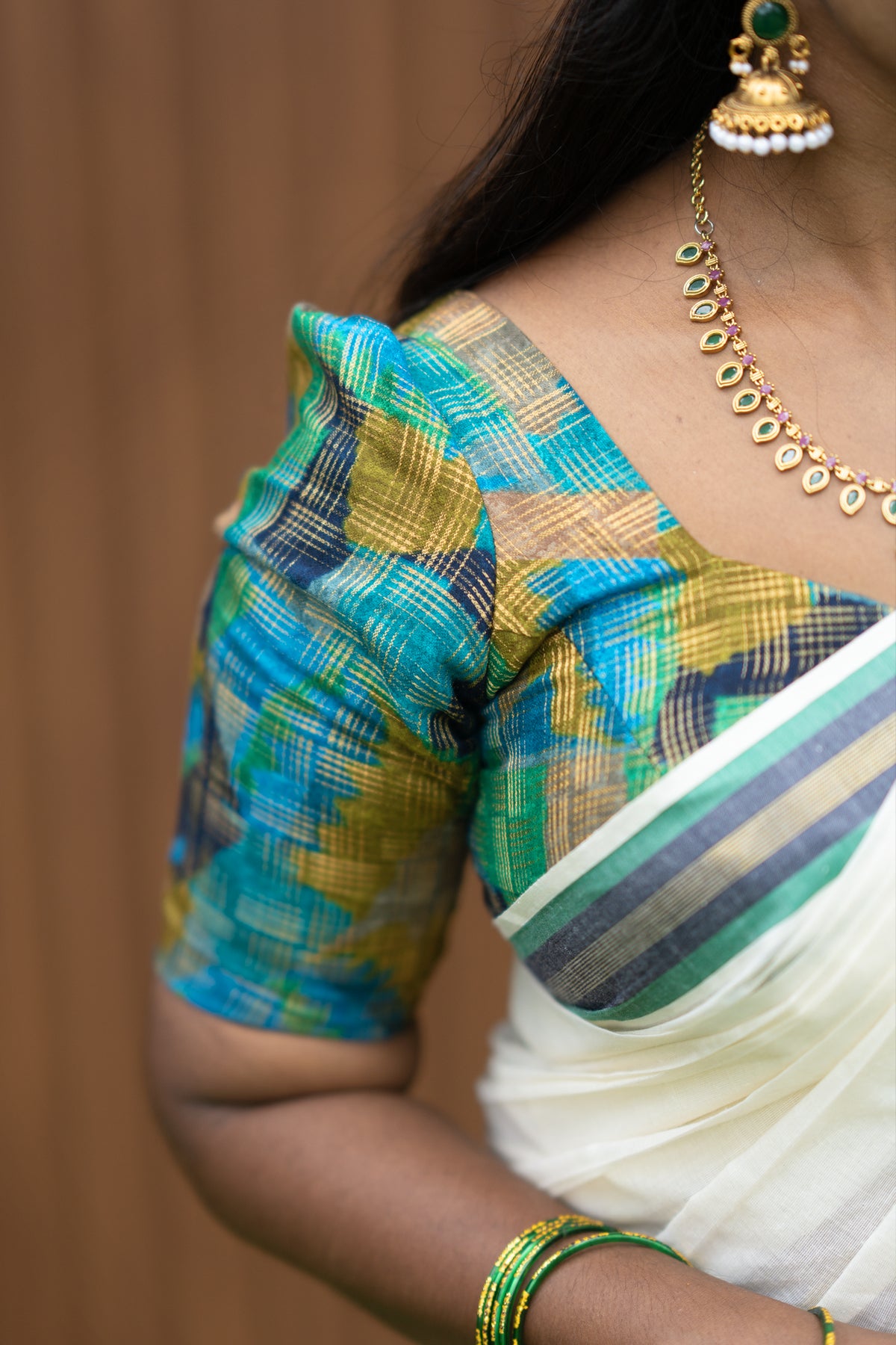 Hiranmayi Settumundu with Green & Light Golden Border and Matching Blouse Material