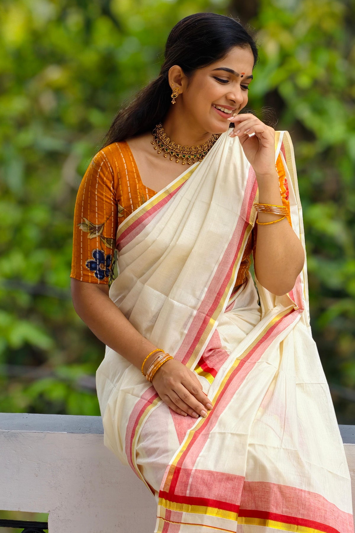 Chendumalli – Yellowish Orange and Golden Kasavu Settumund with Designer Blouse Material