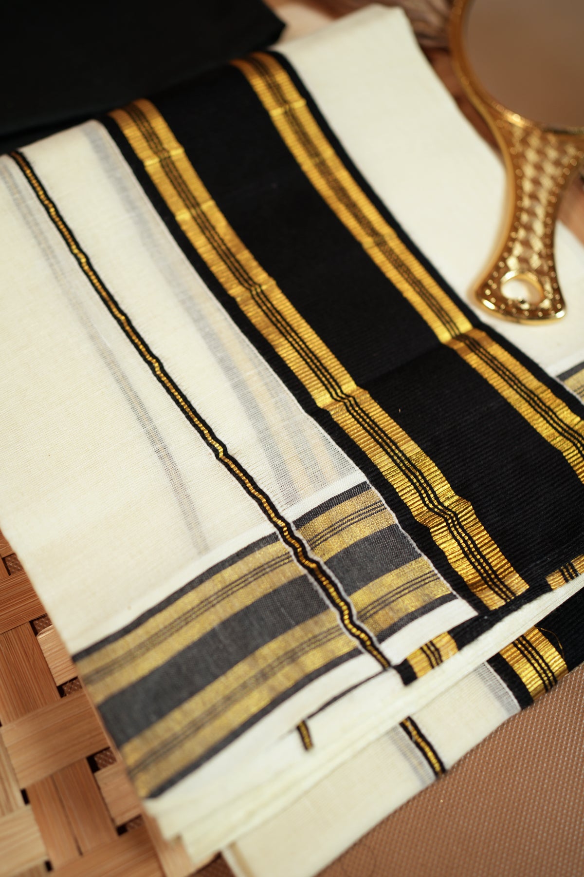 Kudamattam- Black and Golden Kasav Settumund with Golden Kasavu Border Black Blouse Material