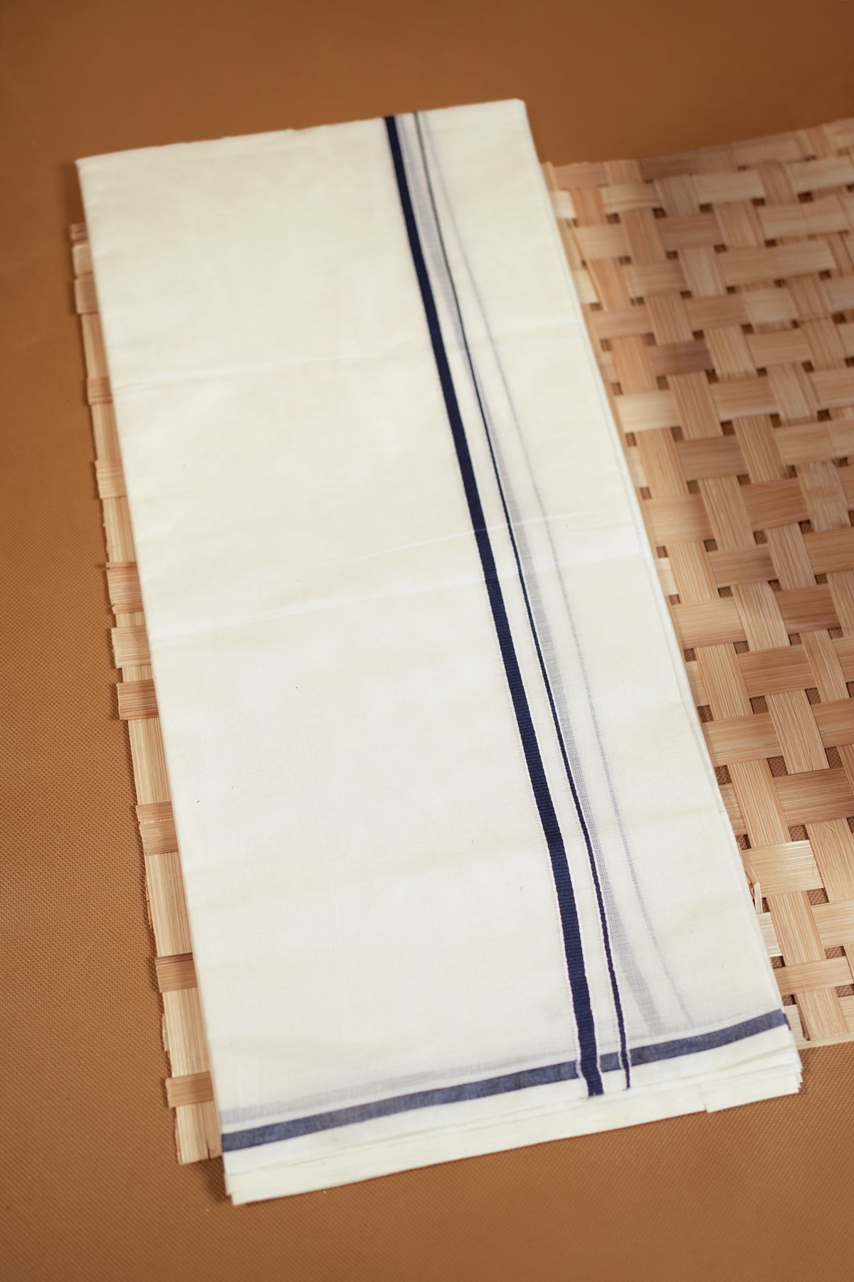 Amrutha- Dark Navy Puliyilakkara Settumund with Printed Blouse Material