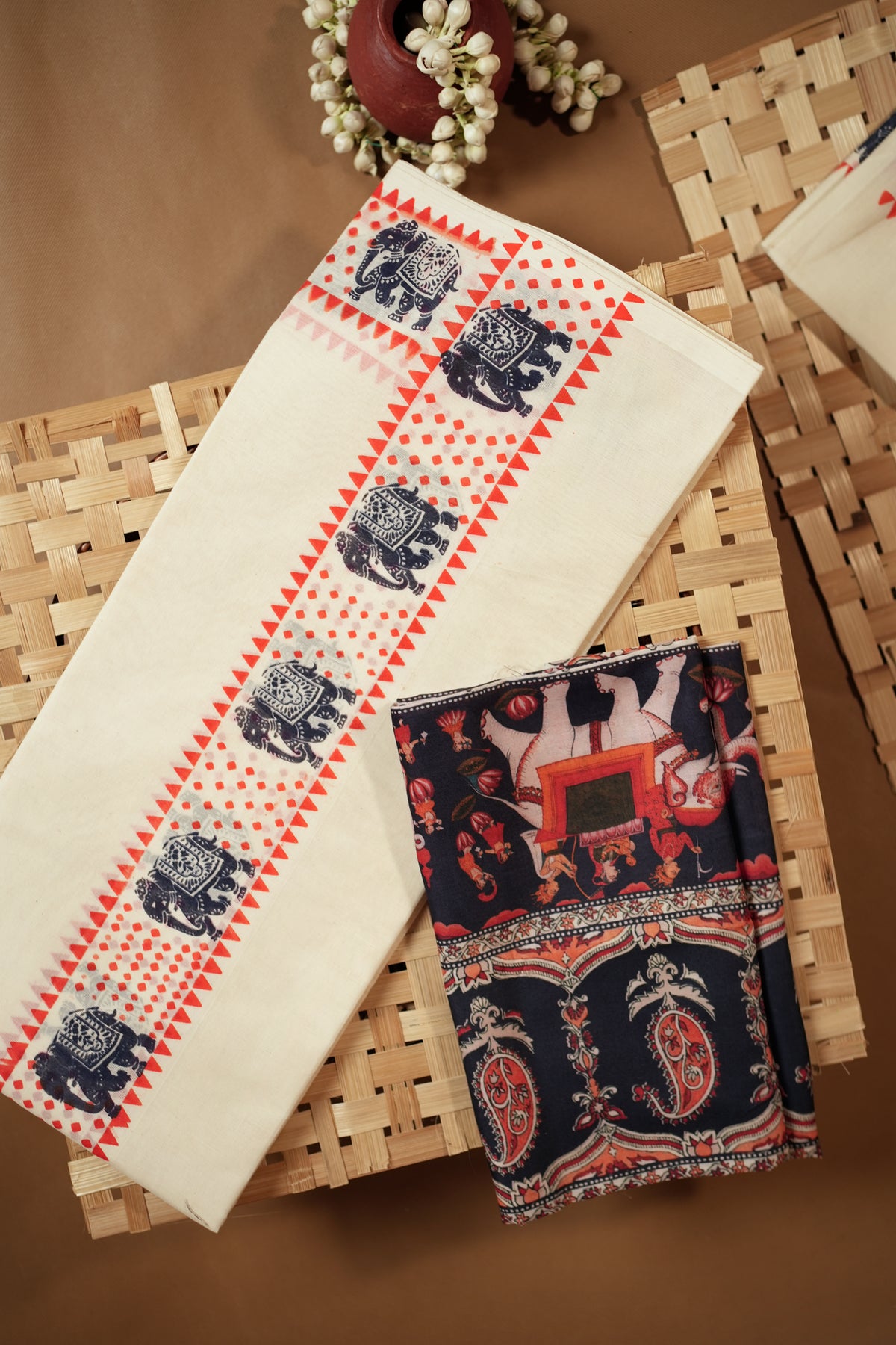 Aanachantham- Orange and Navy Blue Elephant Printed Settumund with Matching Blouse Material