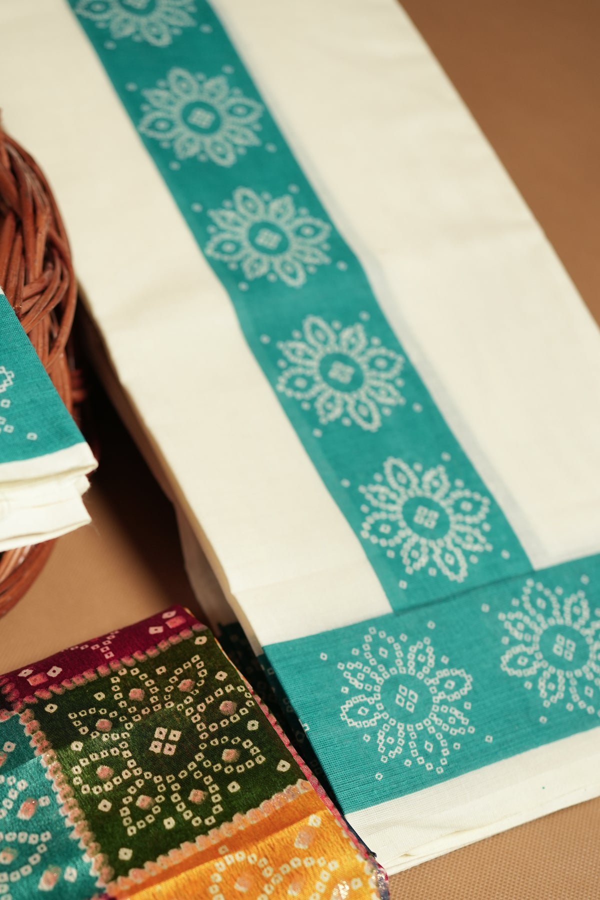 Bhandhini Turquoise Printed Settumund with Matching Blouse Material
