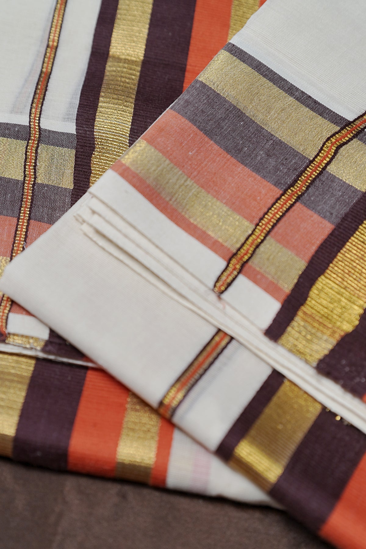 Kaveri – Rust Orange and Coffee Brown Kasavu Settumund with Matching Blouse Material