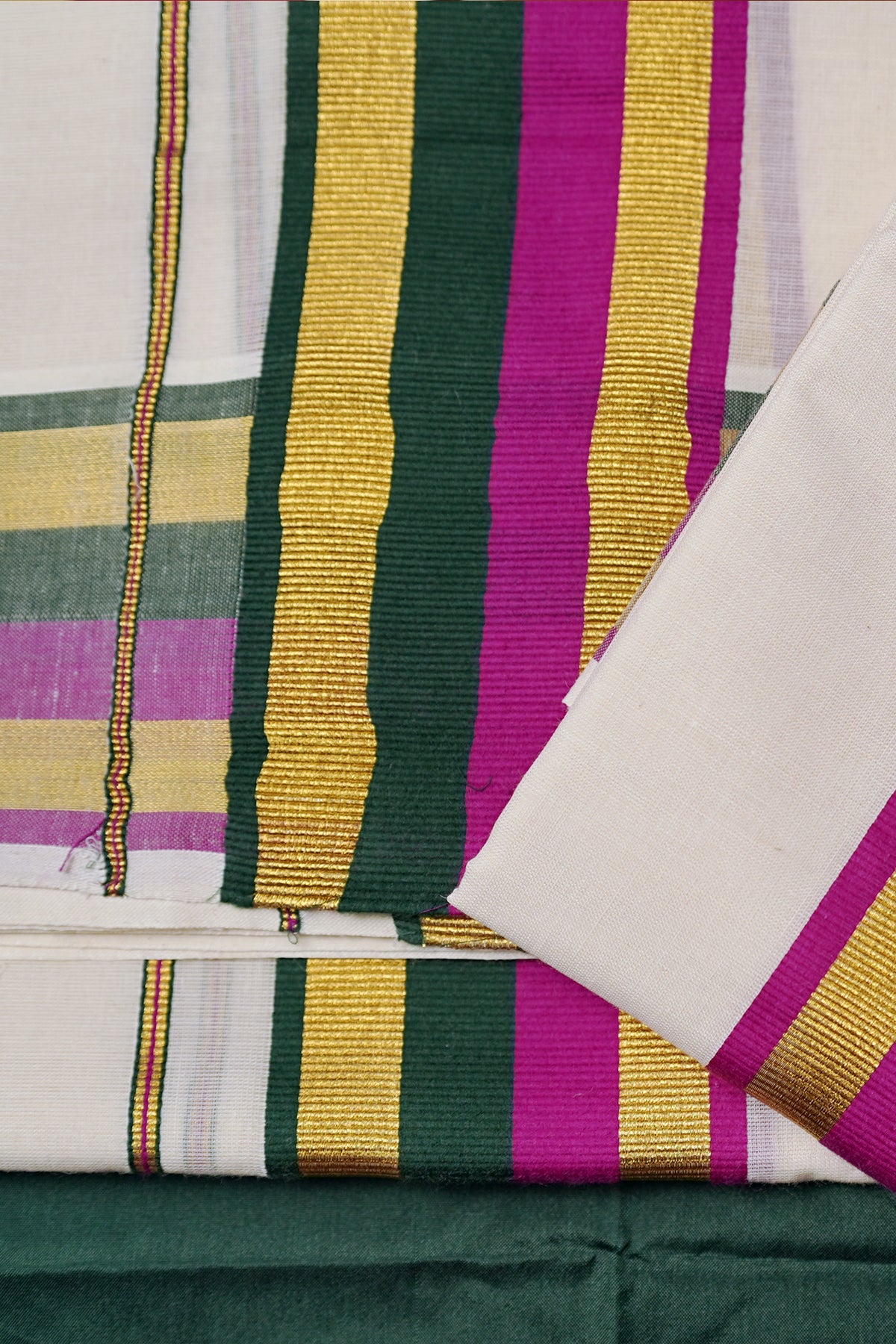 Sindhu – Magenta and Green Kasav Settumund with Matching Blouse Material