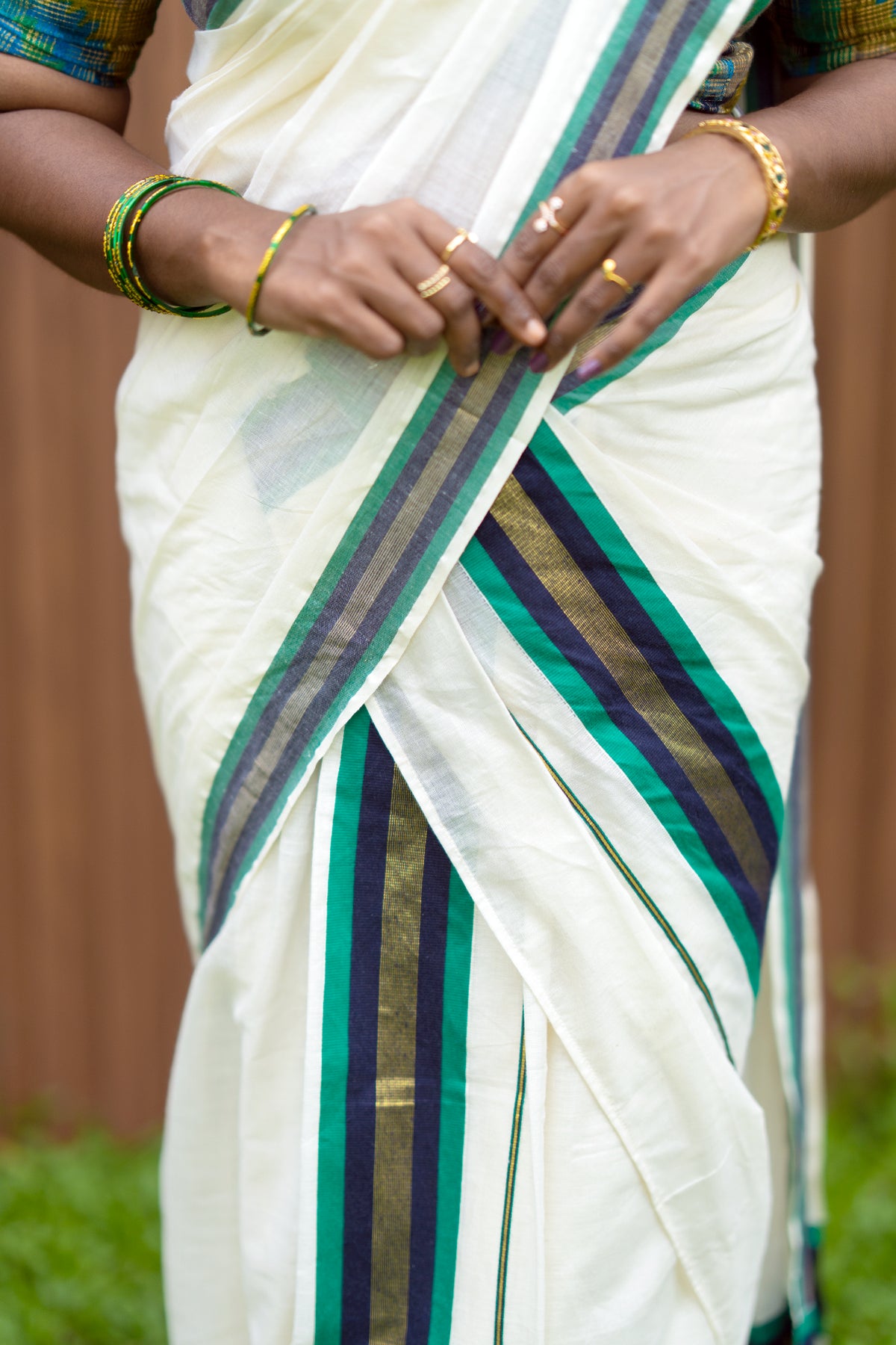 Hiranmayi Settumundu with Green & Light Golden Border and Matching Blouse Material