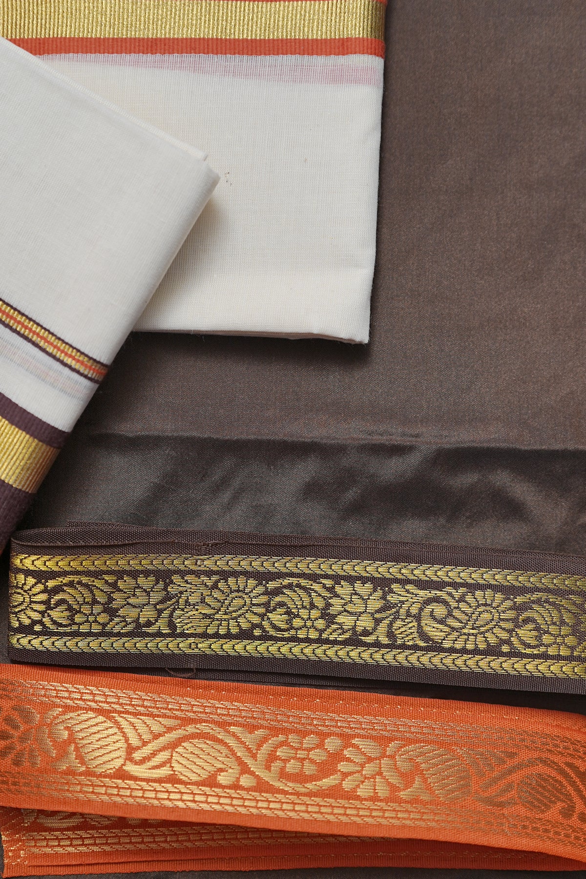 Kaveri – Rust Orange and Coffee Brown Kasavu Settumund with Matching Blouse Material