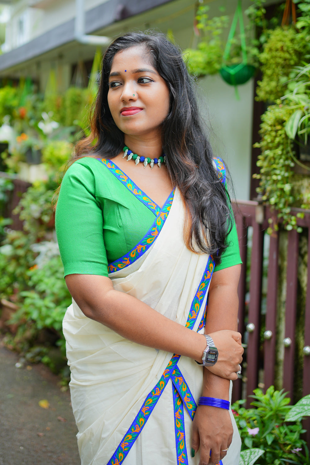 Mayoora Green Settumundu with Stitched Multicolor Border and Plain Blouse Material