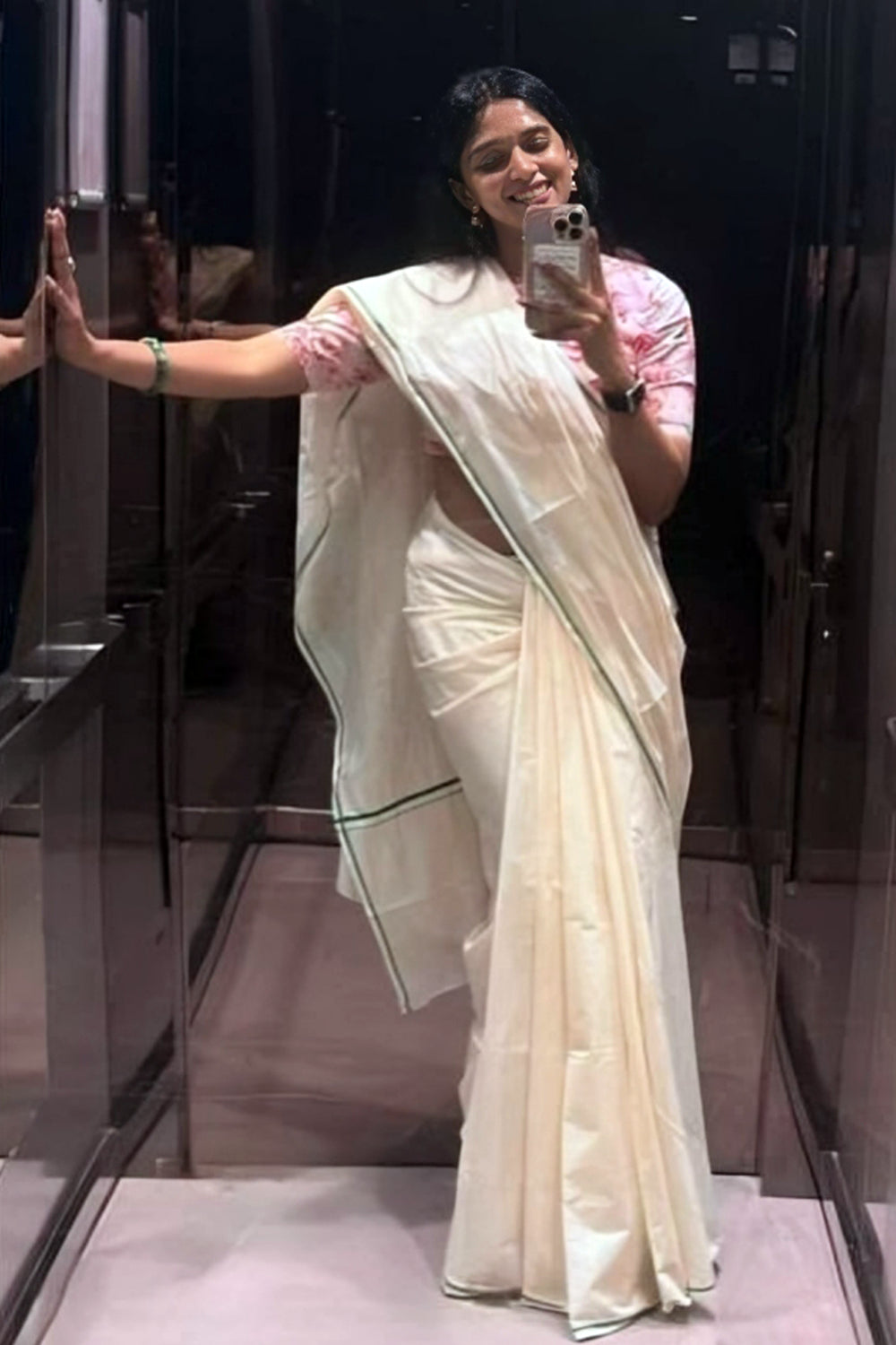 Nyla - Green Puliyilakkara saree with Floral Printed Blouse Material