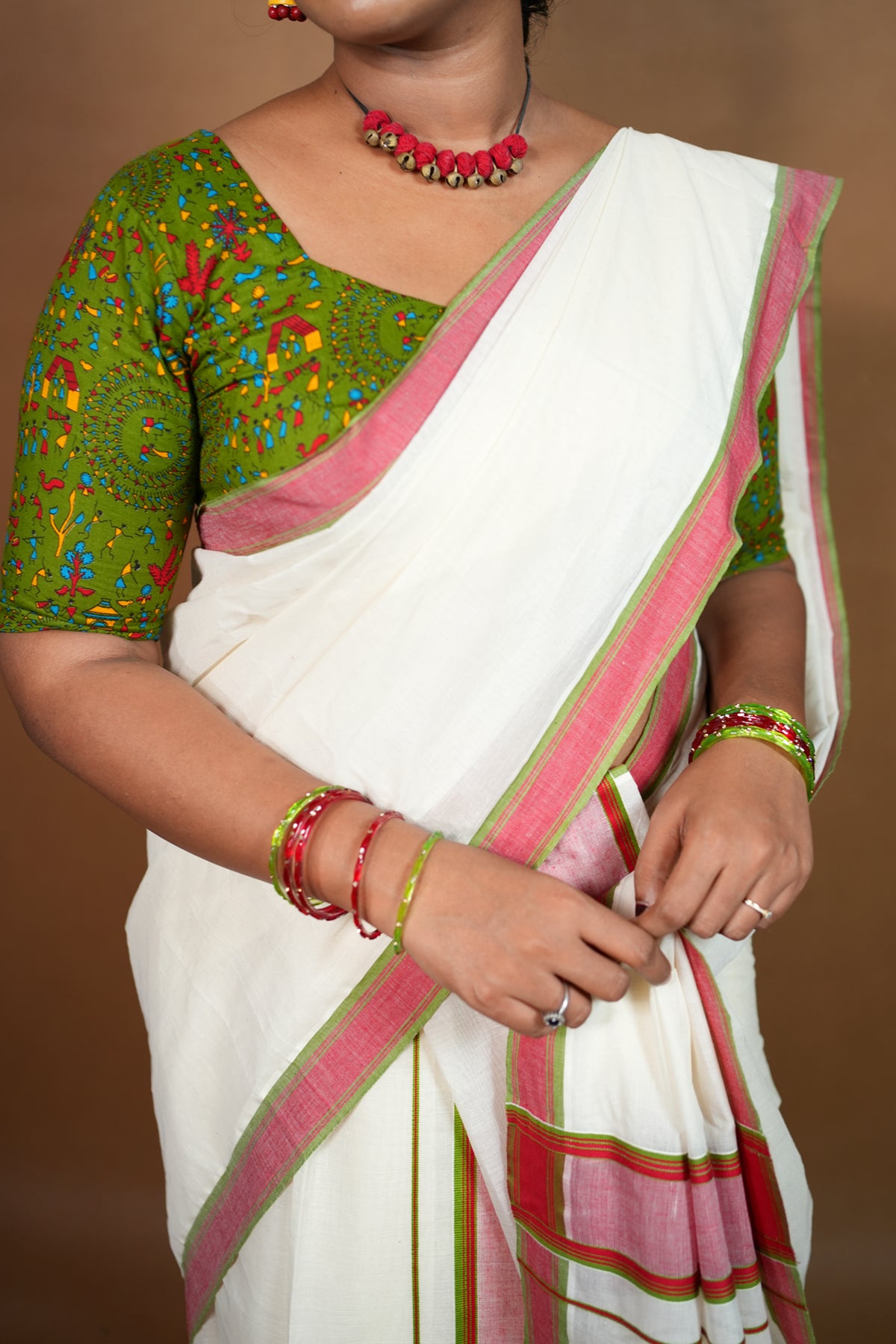 Warly Settumundu with Green Border and Matching Blouse Material