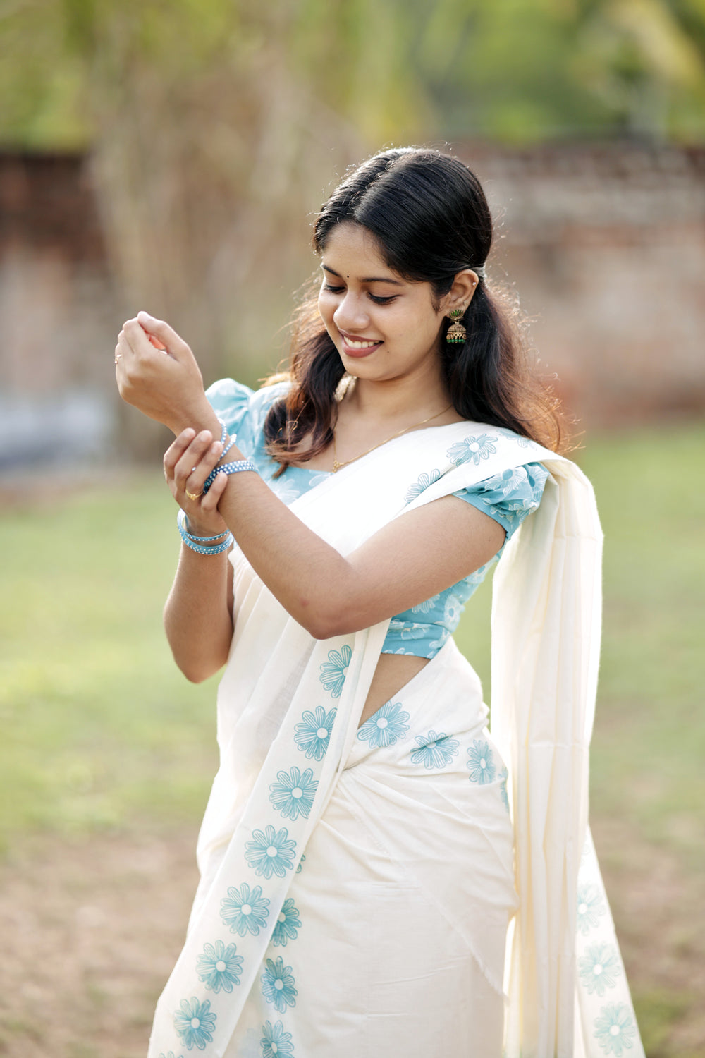 Neelamalhar - Cyan Floral Printed Settumund with Matching Blouse Material