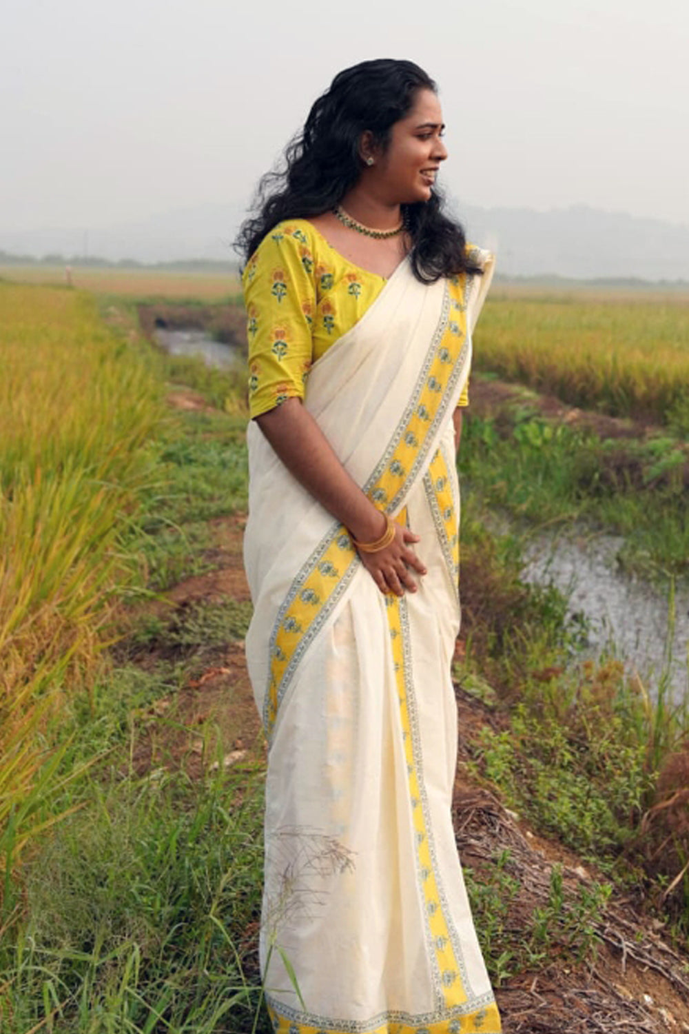 Chithra- Yellow and Green Printed Settumund with Matching Blouse Material