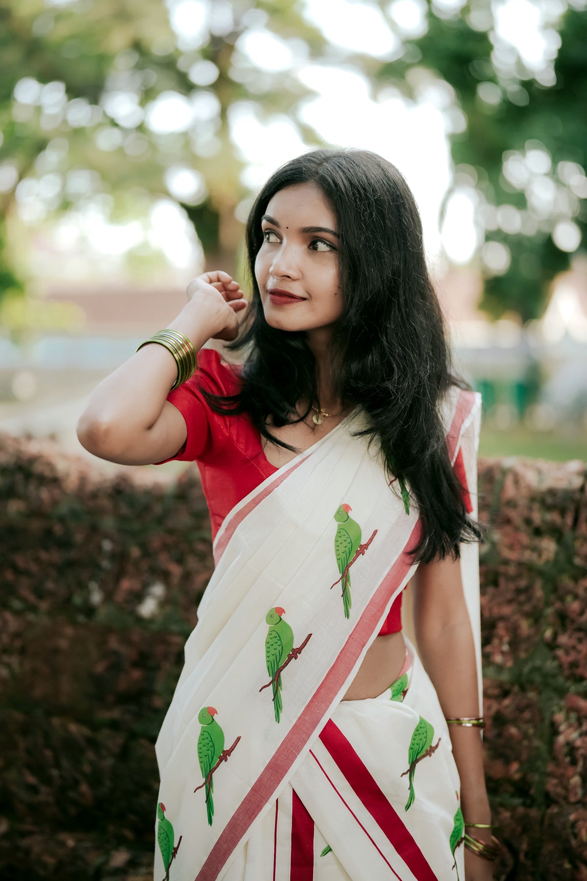 Thatha Green Parrot Printed on Red Kattikkara Settumund with Plain Red Blouse Material