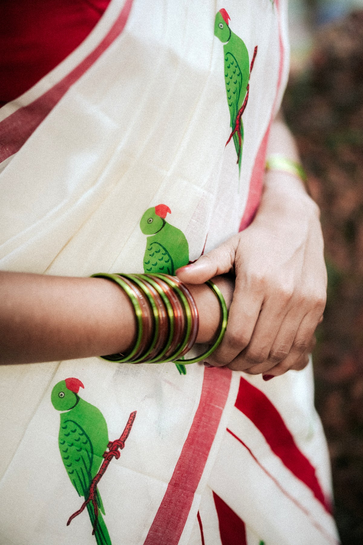 Thatha Green Parrot Printed on Red Kattikkara Settumund with Plain Red Blouse Material