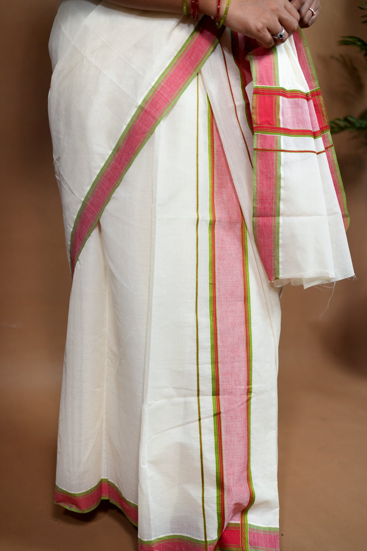 Warly Settumundu with Green Border and Matching Blouse Material