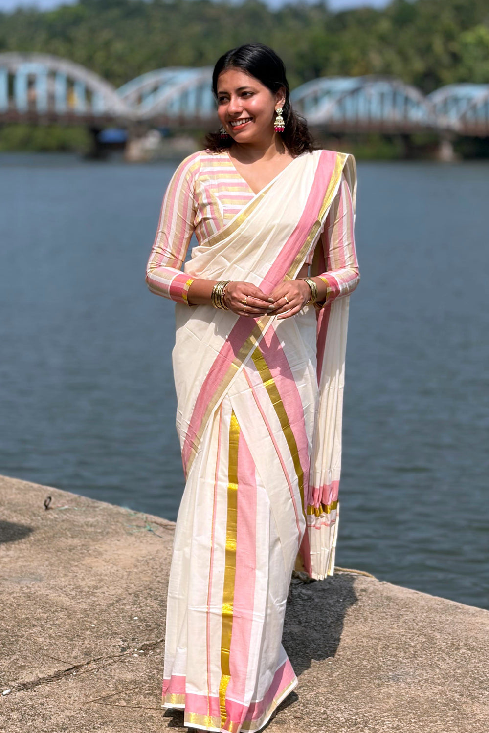Jyothika – Premium Kasav Settumund with Matching Striped Weave Blouse Material