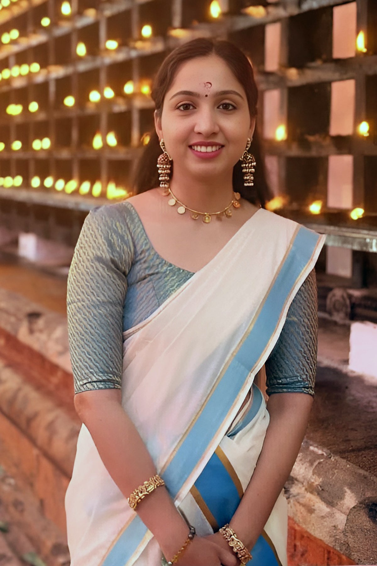 Charutha – Peacock Blue-Green Kasav Settumundu with Matching Brocade Blouse Material