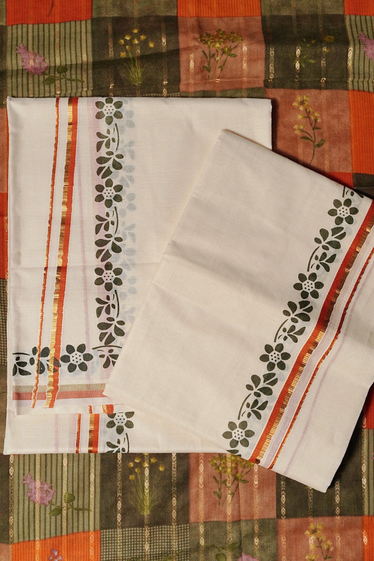 Chandrika – Orange and Golden Kasav Settumund with Printed Border and Designer Blouse Material