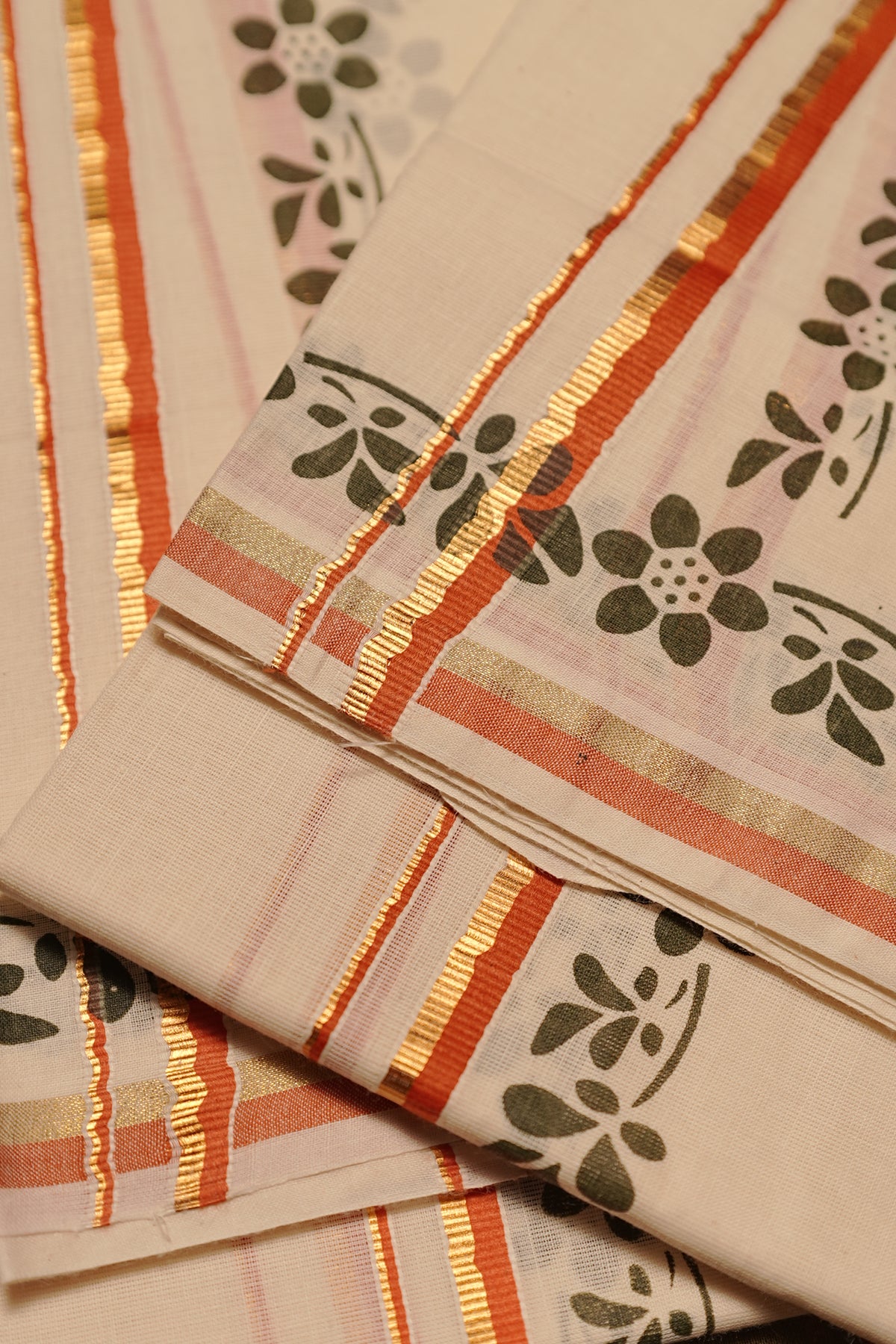 Chandrika – Orange and Golden Kasav Settumund with Printed Border and Designer Blouse Material