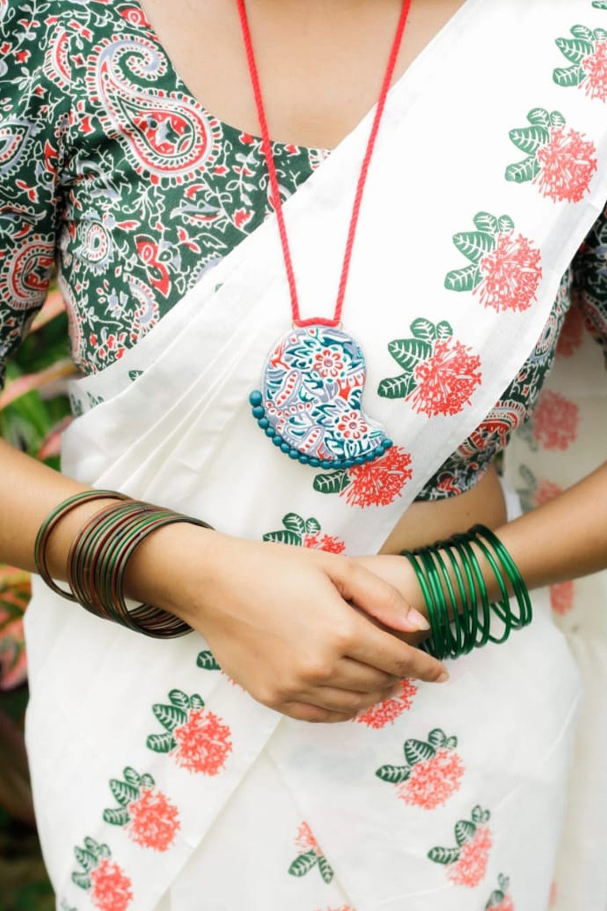 Chethi Red and Green Printed Settumund with Matching Blouse Material