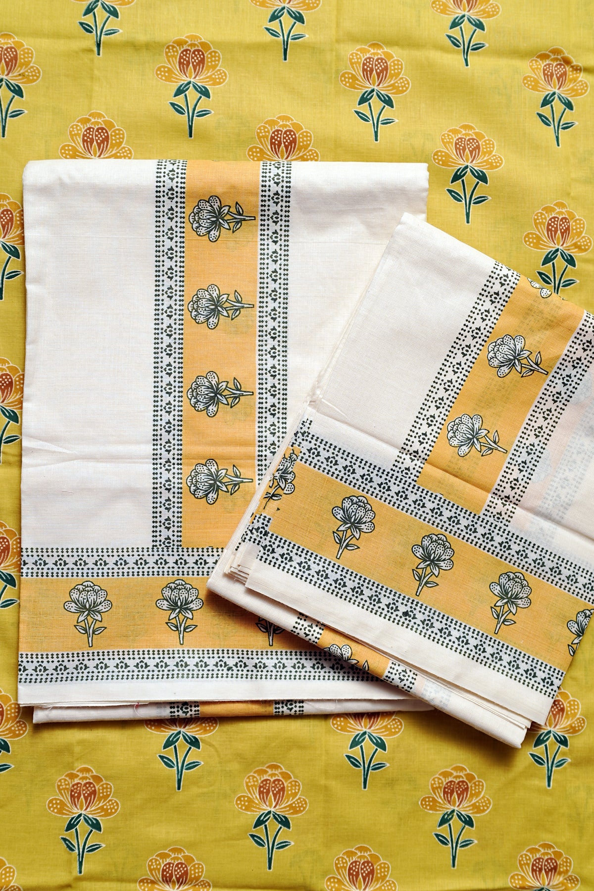 Chithra- Yellow and Green Printed Settumund with Matching Blouse Material
