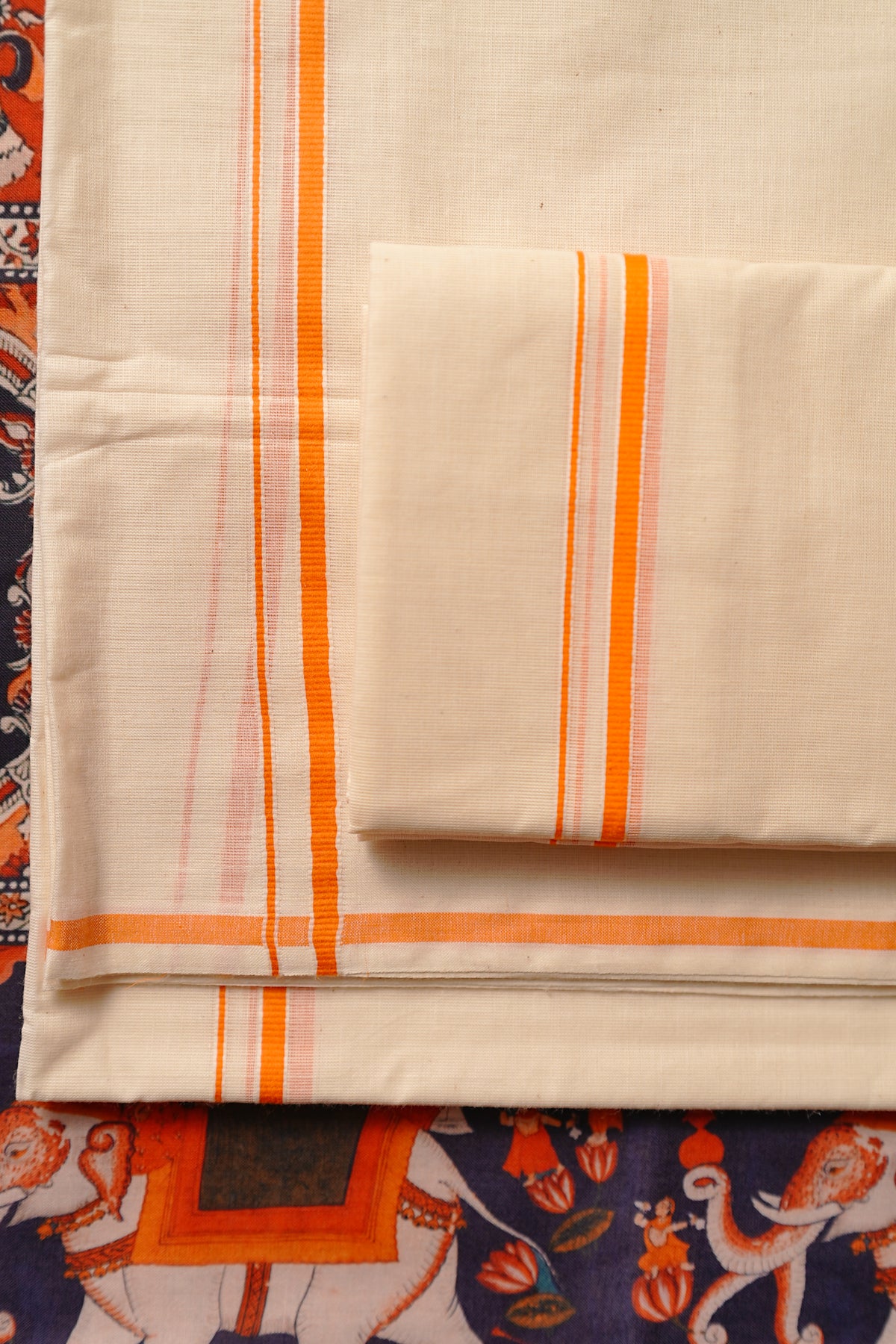 Gadha - Orange Puliyilakkara Settumund with Printed Blouse Material