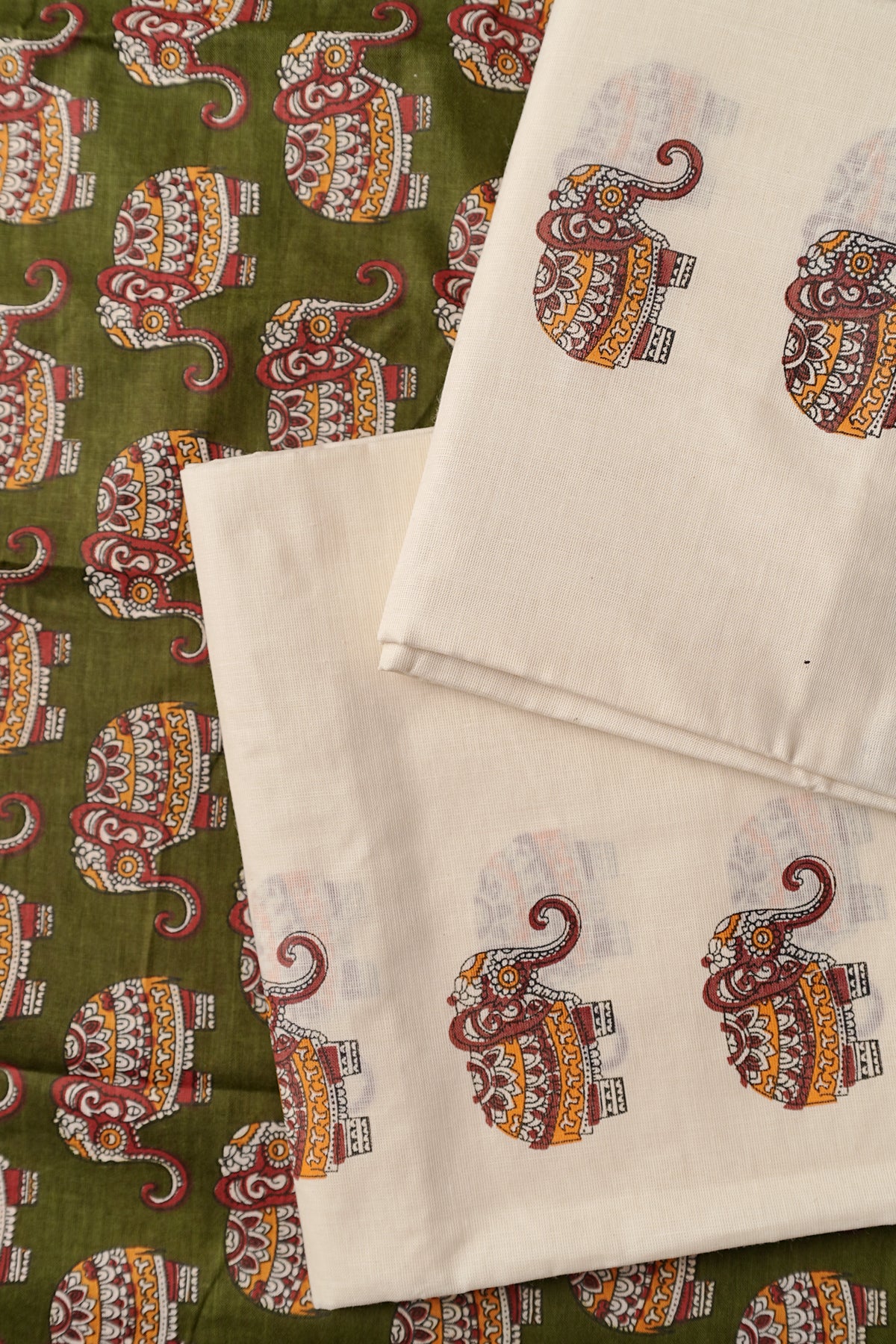 Gajashoba- Green Elephant Printed Settumund with Matching Printed Green Blouse Material
