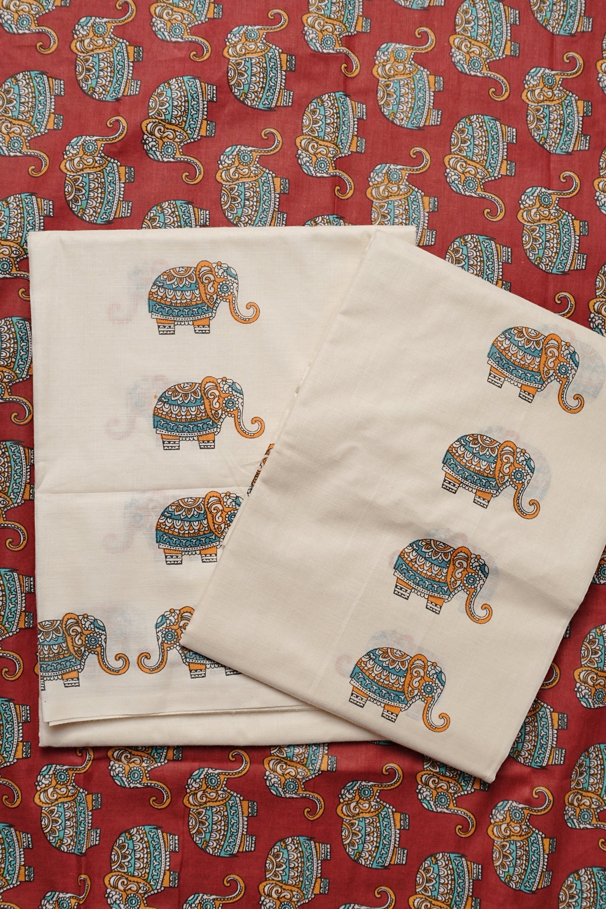 Gajashoba- Red Elephant Printed Settumund with Matching Printed Red Blouse Material