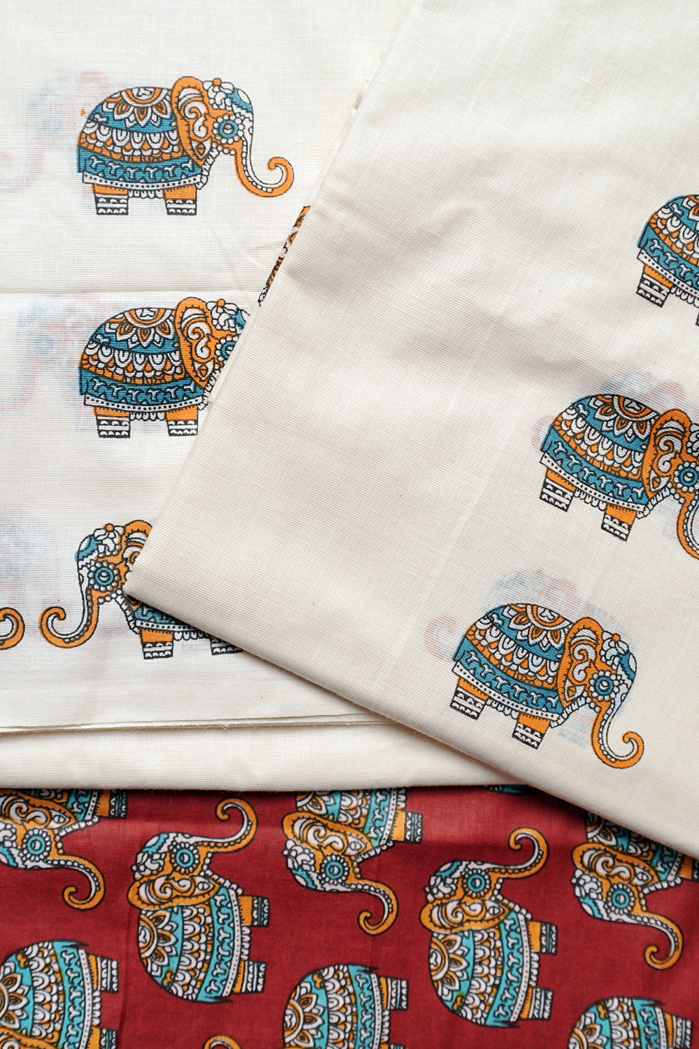 Gajashoba- Red Elephant Printed Settumund with Matching Printed Red Blouse Material