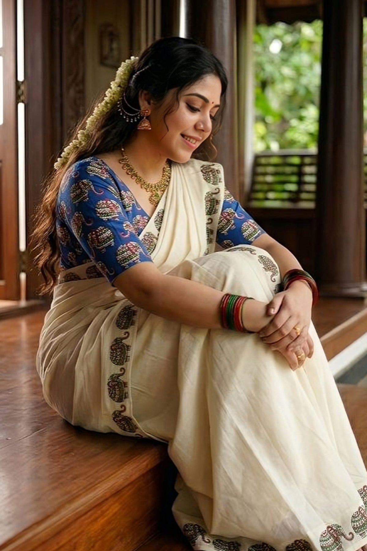 Gajashoba- Blue Elephant Printed Settumund with Matching Printed Blouse Material
