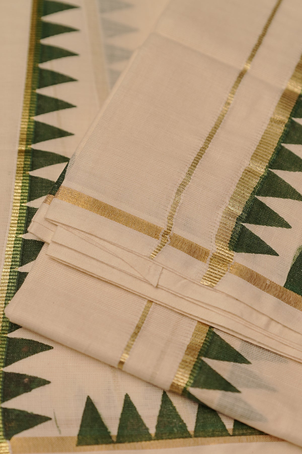 Pacha– Green Temple Printed Settumund with Kasav Border Blouse Material