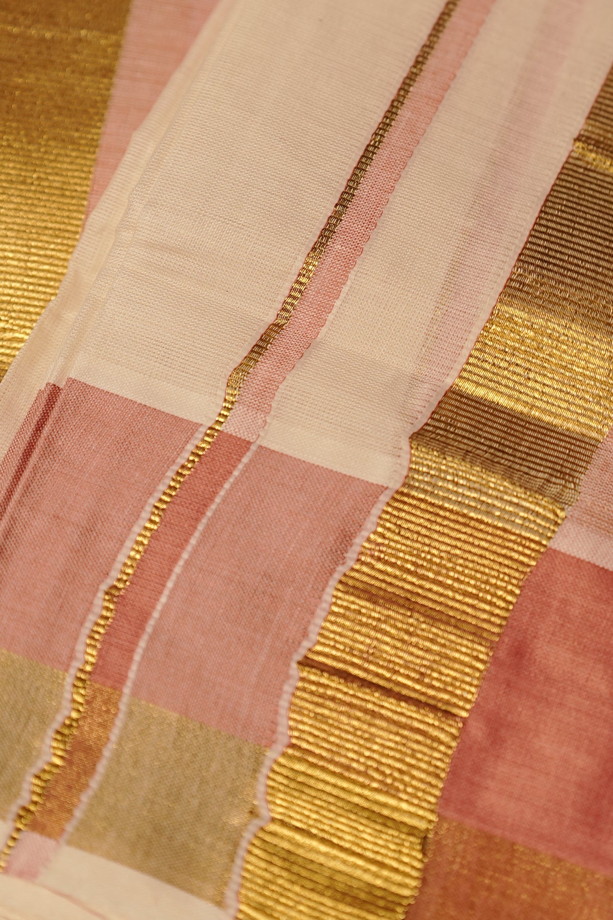 Jyothika – Premium Kasav Settumund with Matching Striped Weave Blouse Material