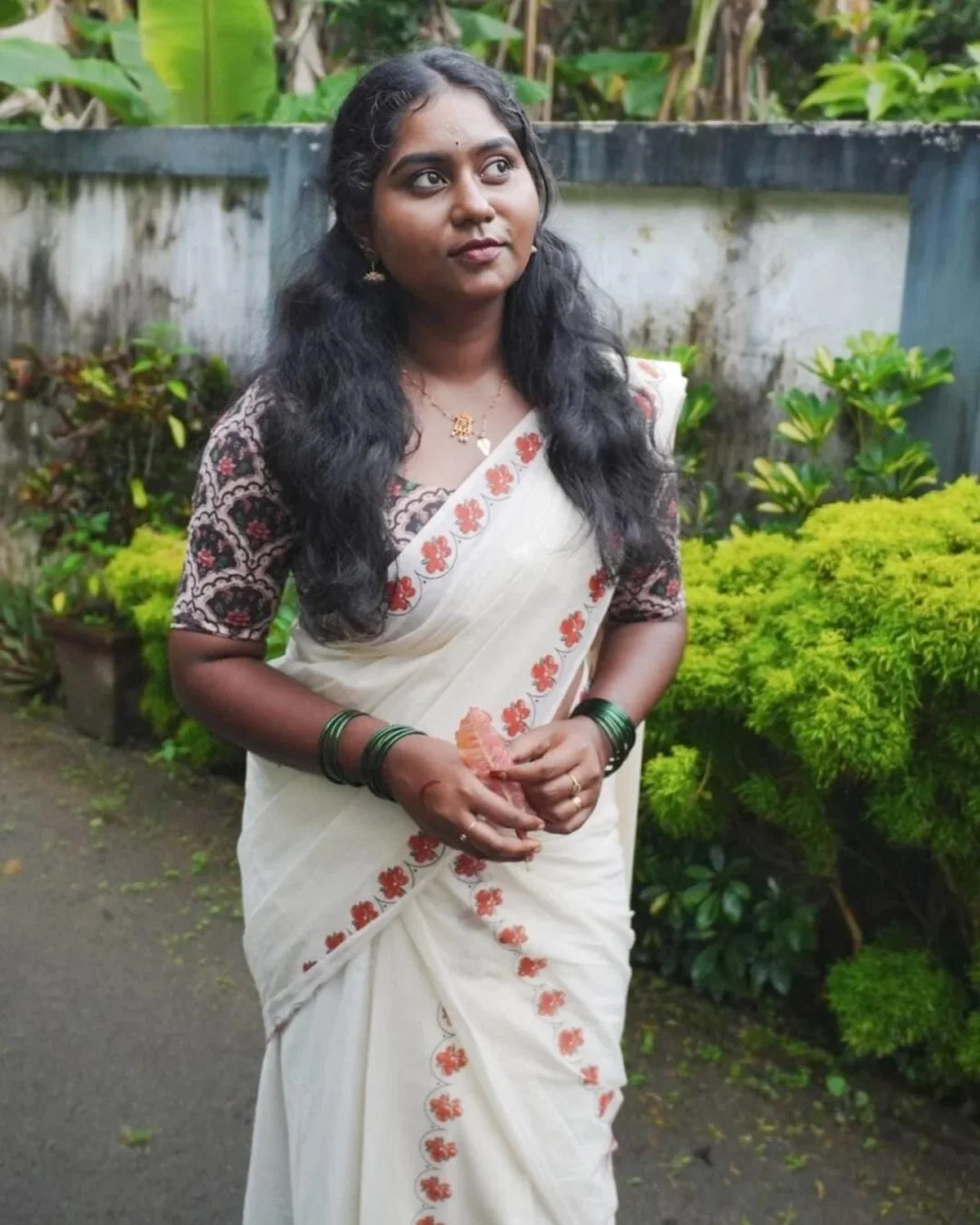 Kanakambaram- Orange and Green Kanakambaram Printed Settumund With Matching Blouse Material