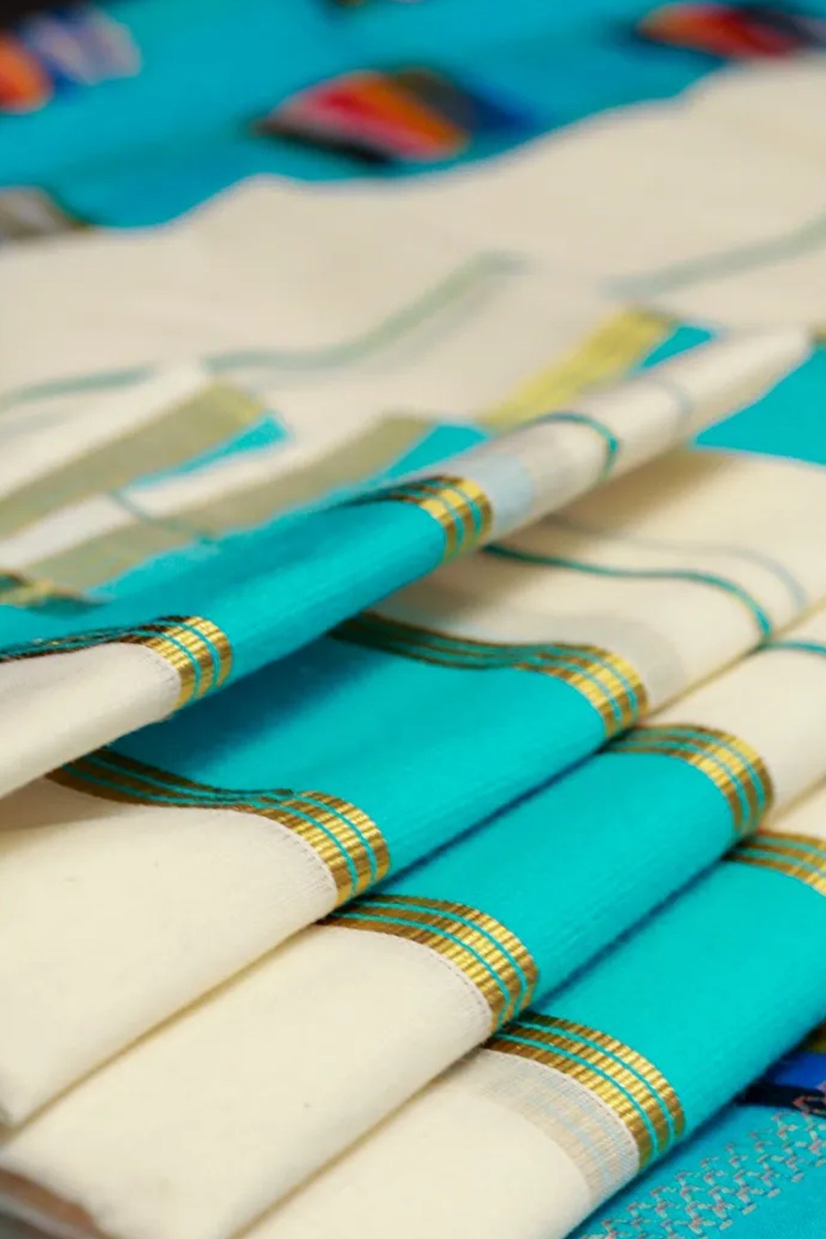 Karthika- Blue and Golden Kasav Settumund with Designer Blouse Material