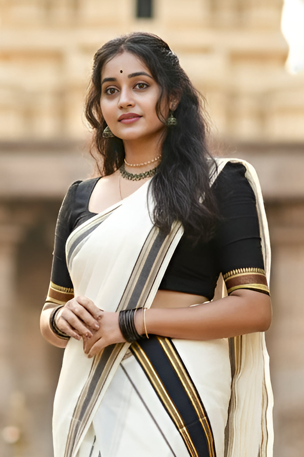 Kudamattam- Black and Golden Kasav Settumund with Golden Kasavu Border Black Blouse Material