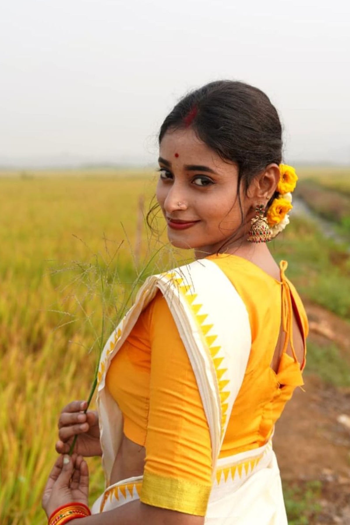 Madhavi – Yellow Temple Printed Settumund with Kasav Border Blouse Material