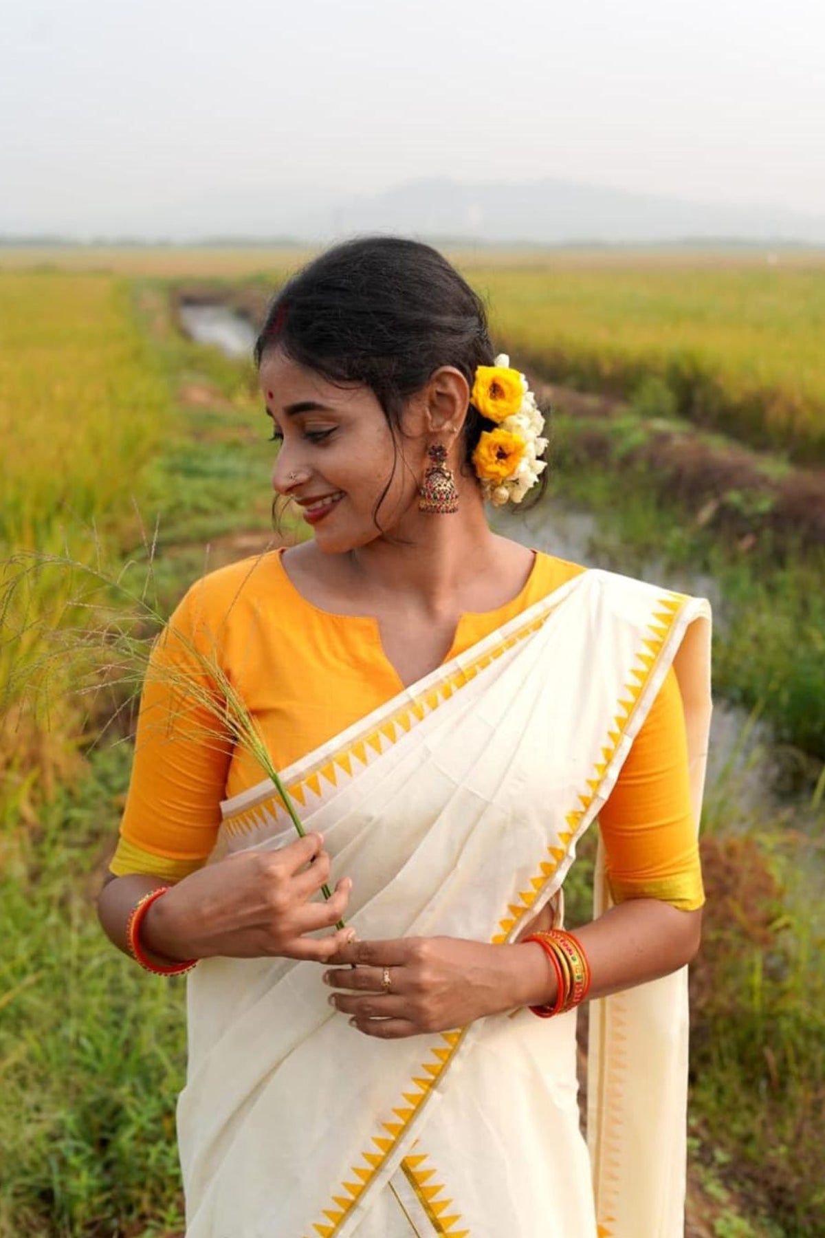 Madhavi – Yellow Temple Printed Settumund with Kasav Border Blouse Material