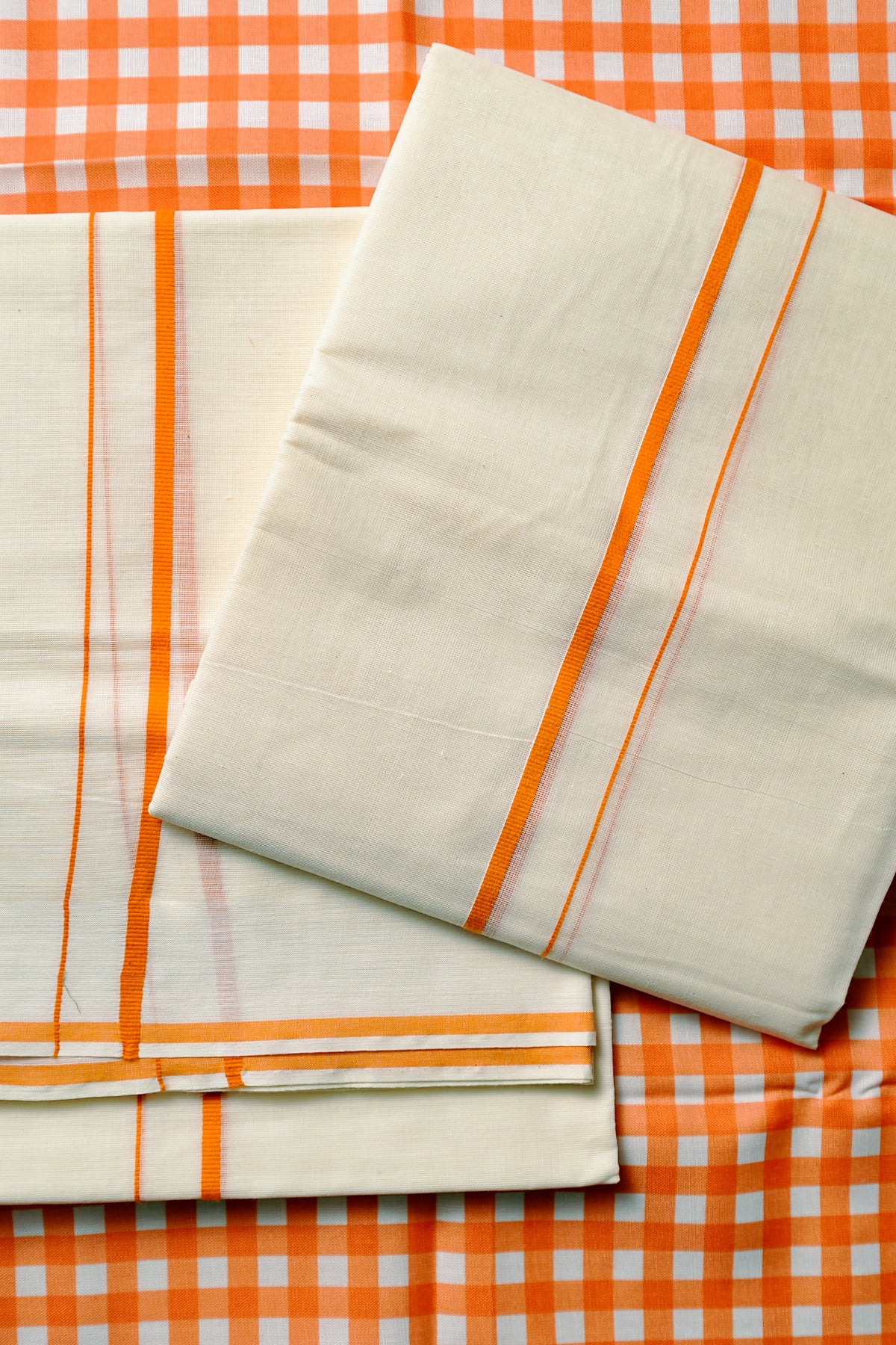 Tapasya -Orange Puliyilakkara Settu Mundu with Checked Blouse Material