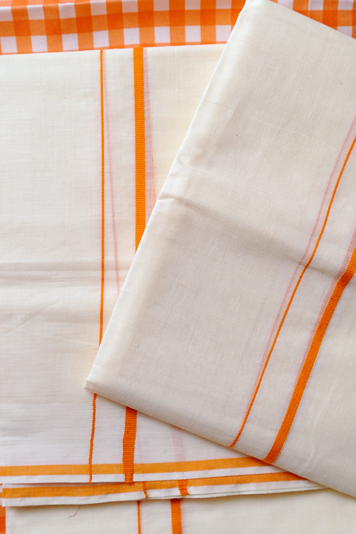 Tapasya -Orange Puliyilakkara Settu Mundu with Checked Blouse Material