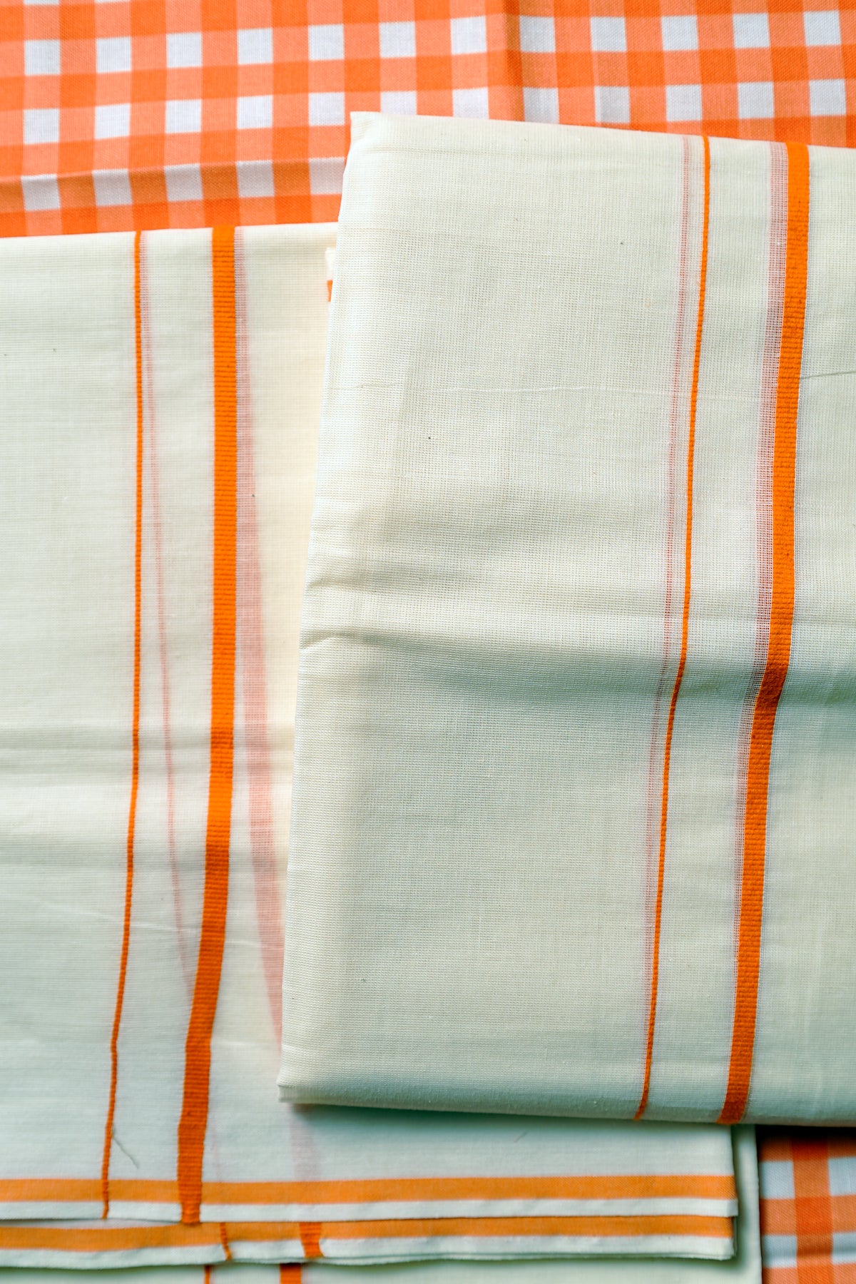 Tapasya -Orange Puliyilakkara Settu Mundu with Checked Blouse Material