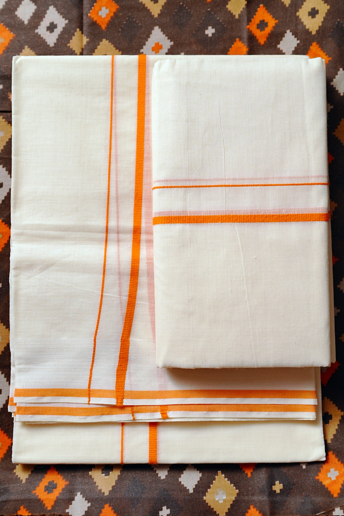 Pavithra -Orange puliyilakkara with Blouse Material